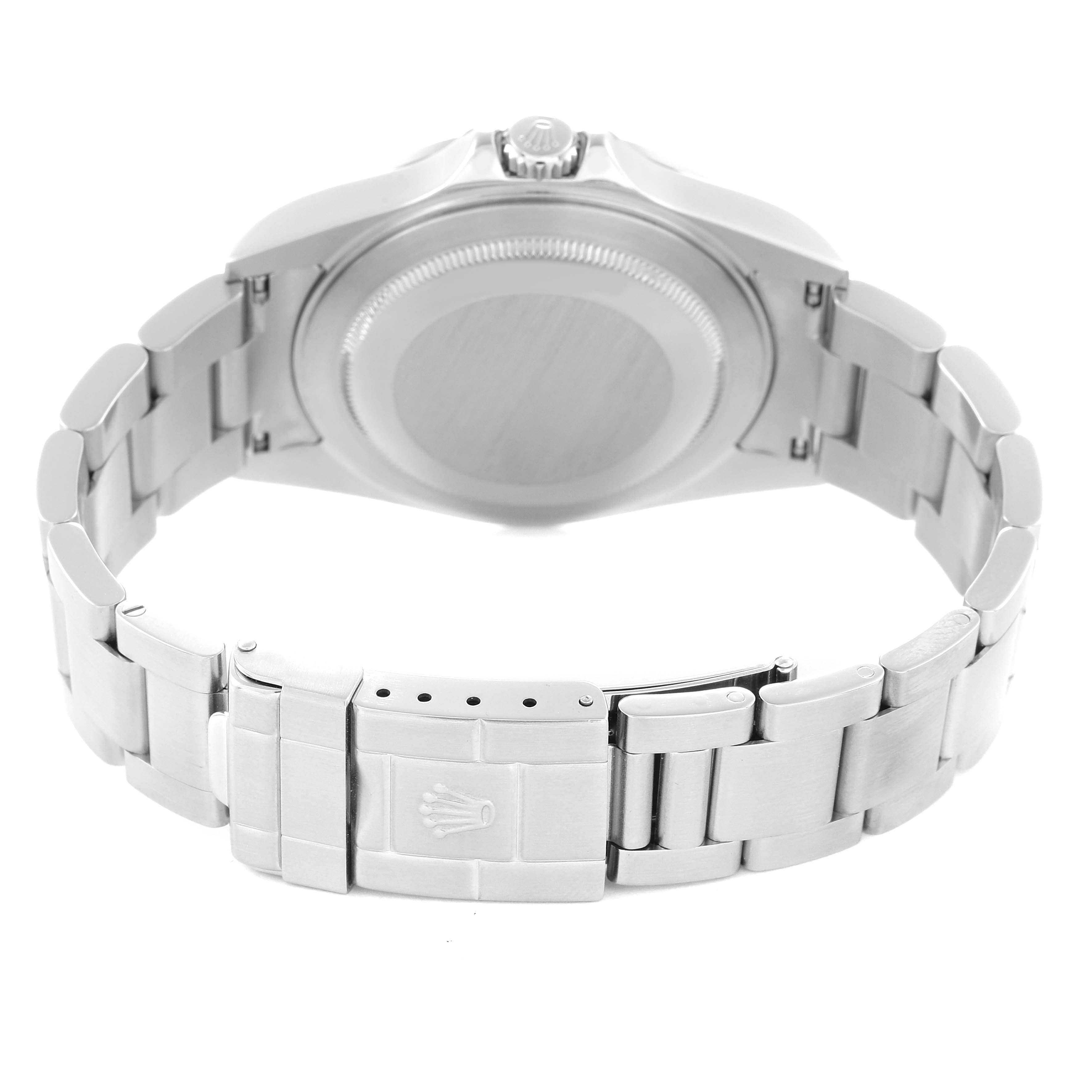 The image shows a rear view of the Rolex Explorer model 16570 men’s watch, highlighting the case back, crown, and bracelet with the clasp visible.