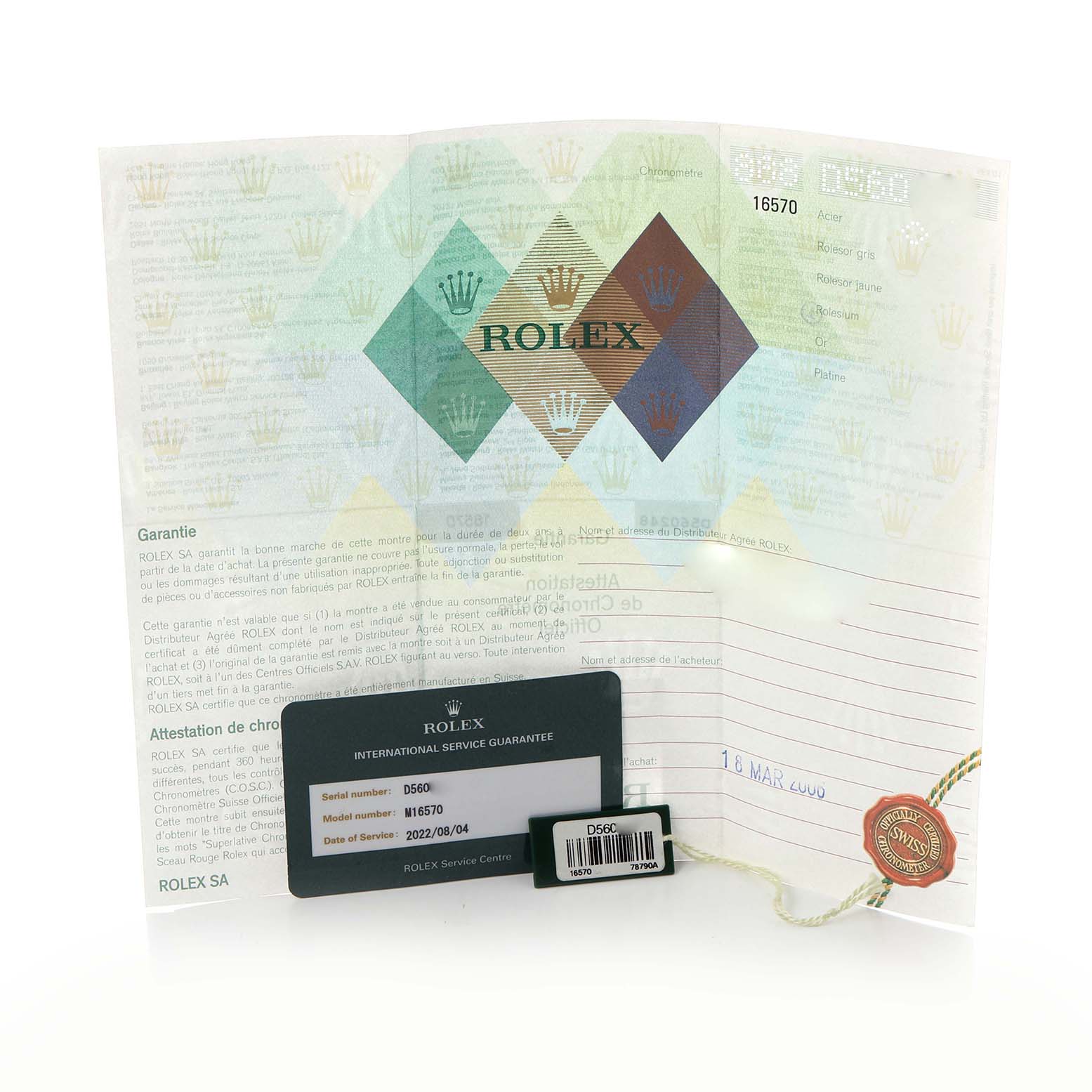 The image shows documentation and accessories for a Rolex Explorer model 16570, including an international service guarantee card and a red seal.