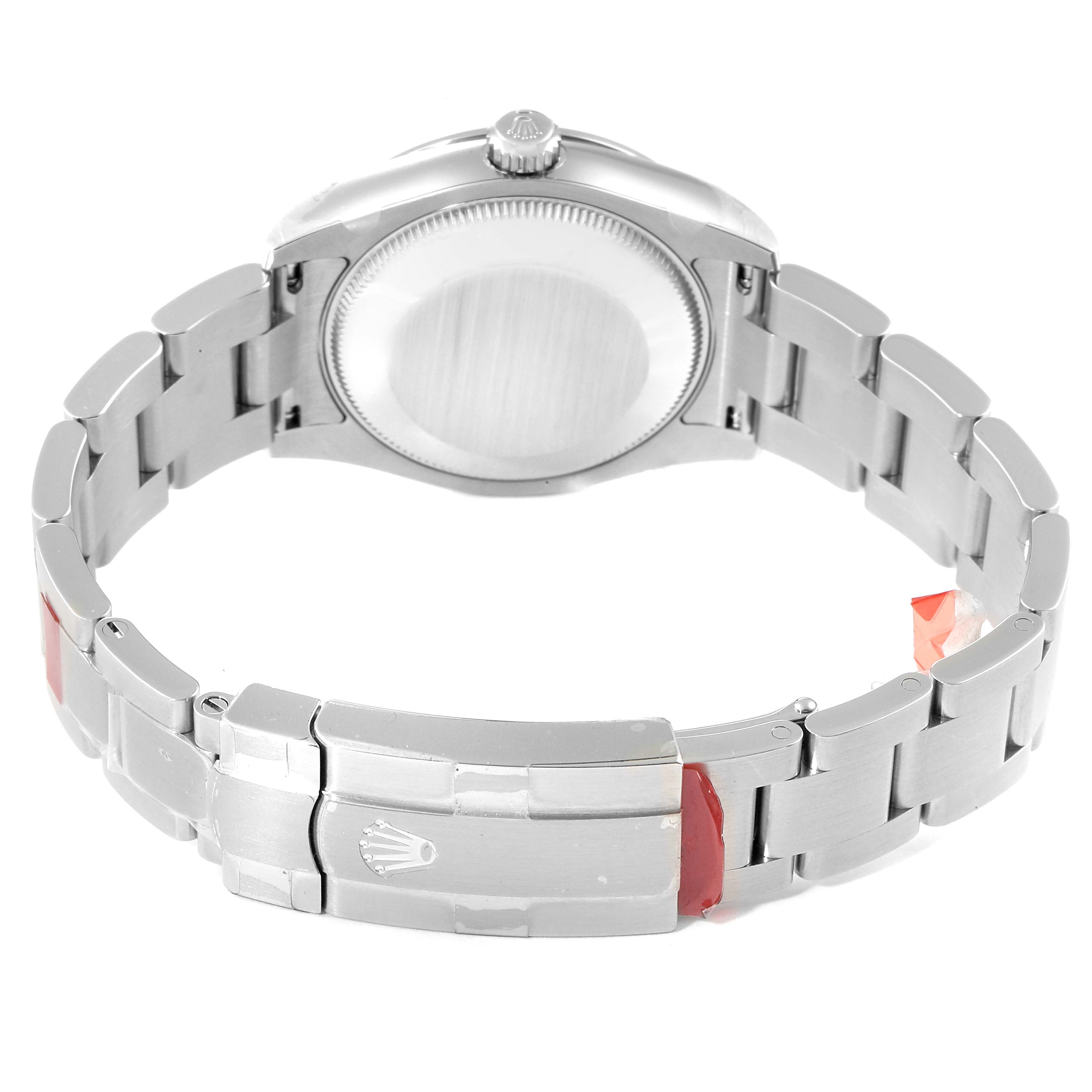 This image shows the back and bracelet of the Mid-Size Rolex watch.