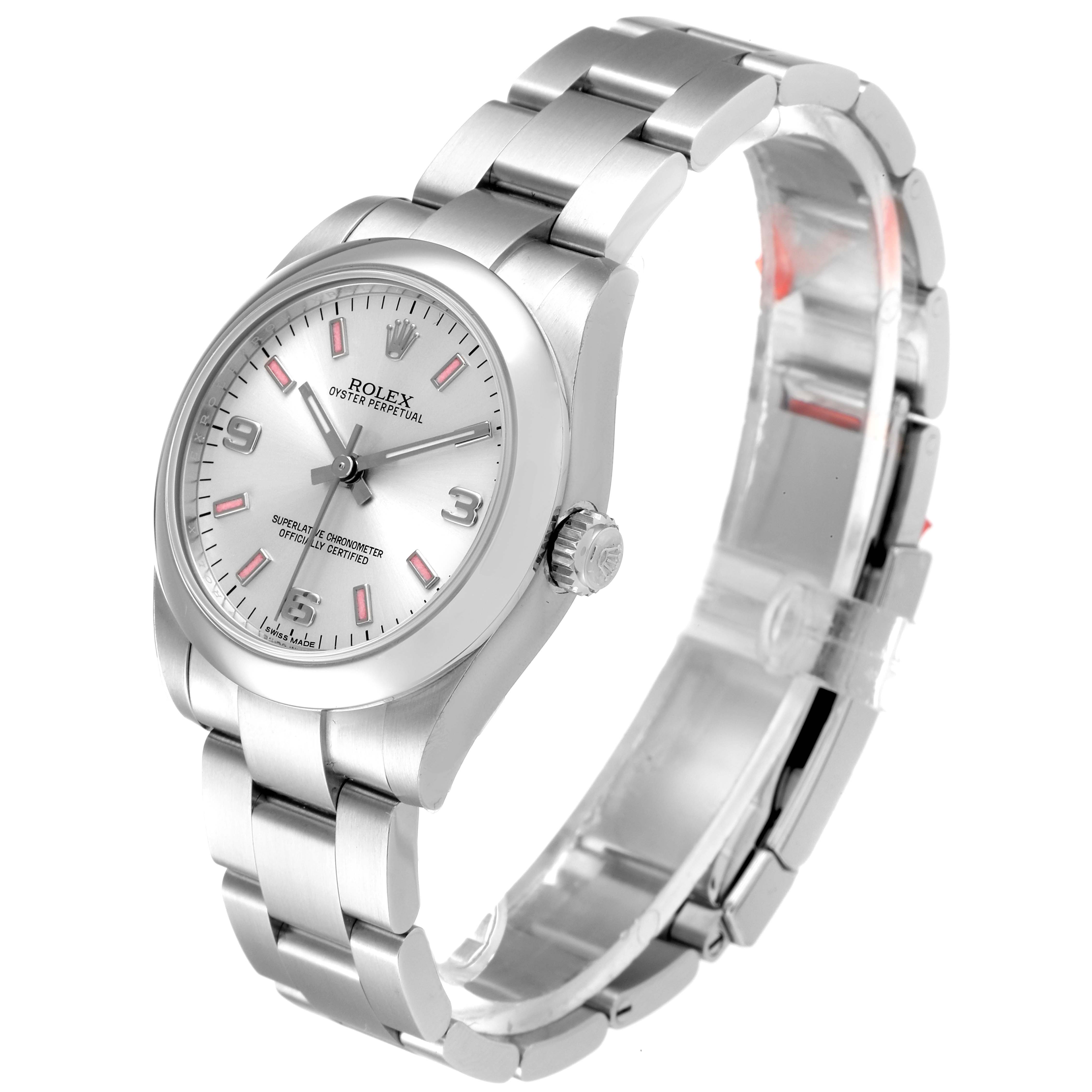The image shows a side-angle view of a Rolex Oyster Perpetual Mid-Size watch, highlighting its face, crown, and metal bracelet.
