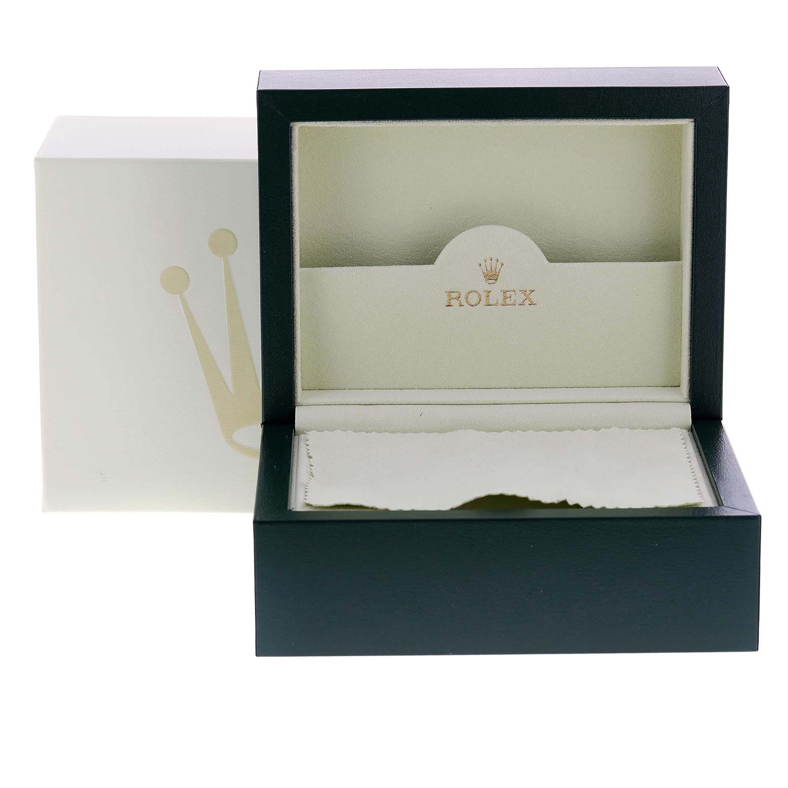 This image shows the open box and outer packaging for a Rolex Milgauss 116400GV Men
s Stainless Steel Black Dial 116400GV Men
s Stainless Steel Black Dial watch from a front angle.