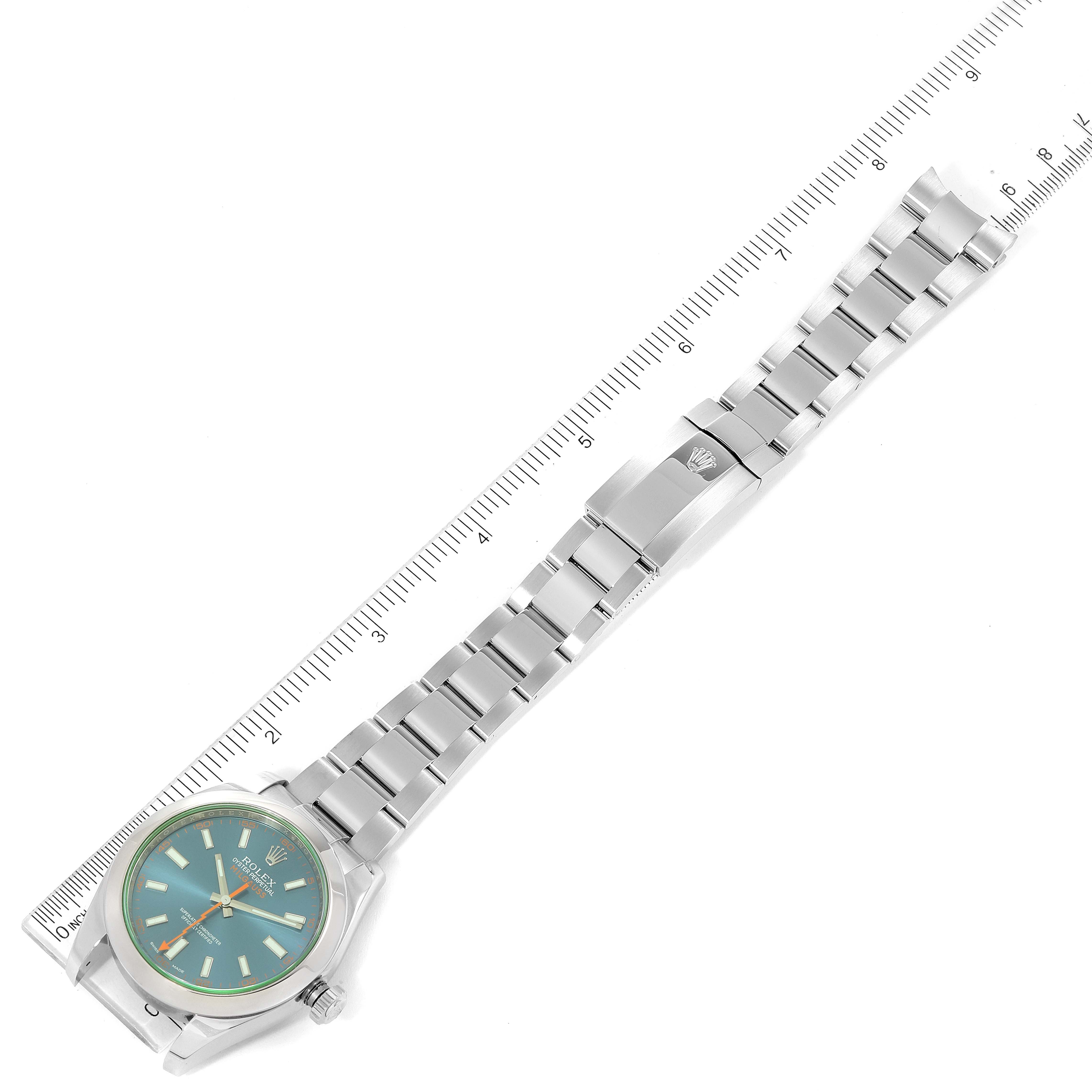 This image shows a top-down view of a Rolex Milgauss 116400GV Men's Stainless Steel Blue Dial 116400GV Men's Stainless Steel Blue Dial watch, displaying its face, band, and clasp alongside a ruler for scale.