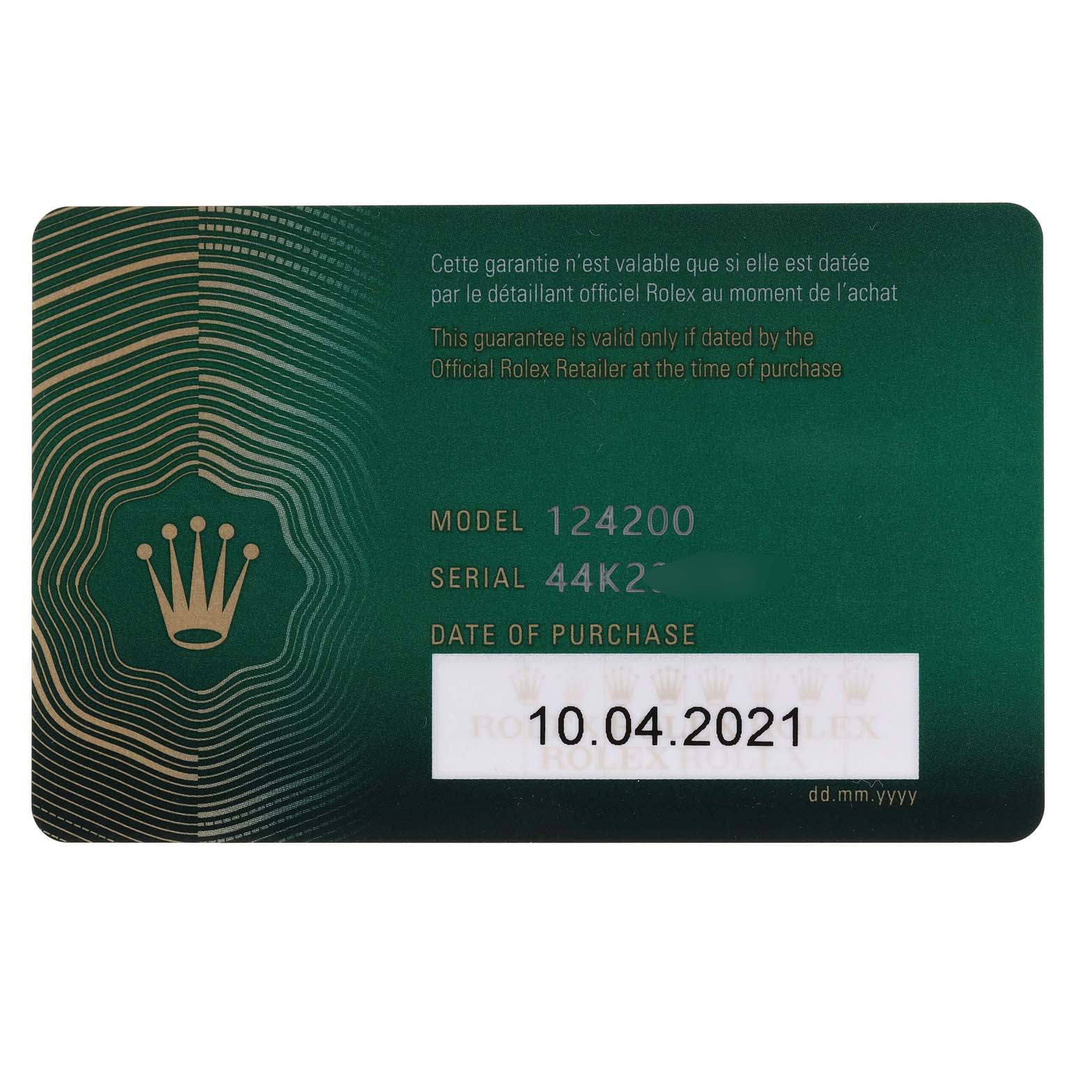 The image shows the Rolex guarantee card with the model number 124200 for the Oyster Perpetual watch.