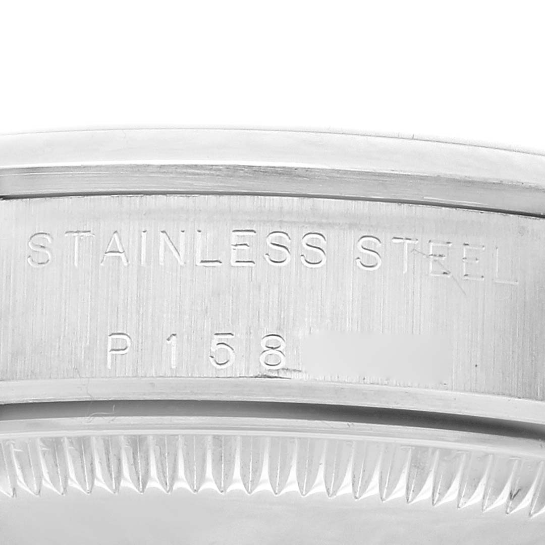 This image shows a close-up of the stainless steel case back of a Rolex Mid-Size 77080 Women's Stainless Steel White Dial 77080 Women's Stainless Steel White Dial model watch.