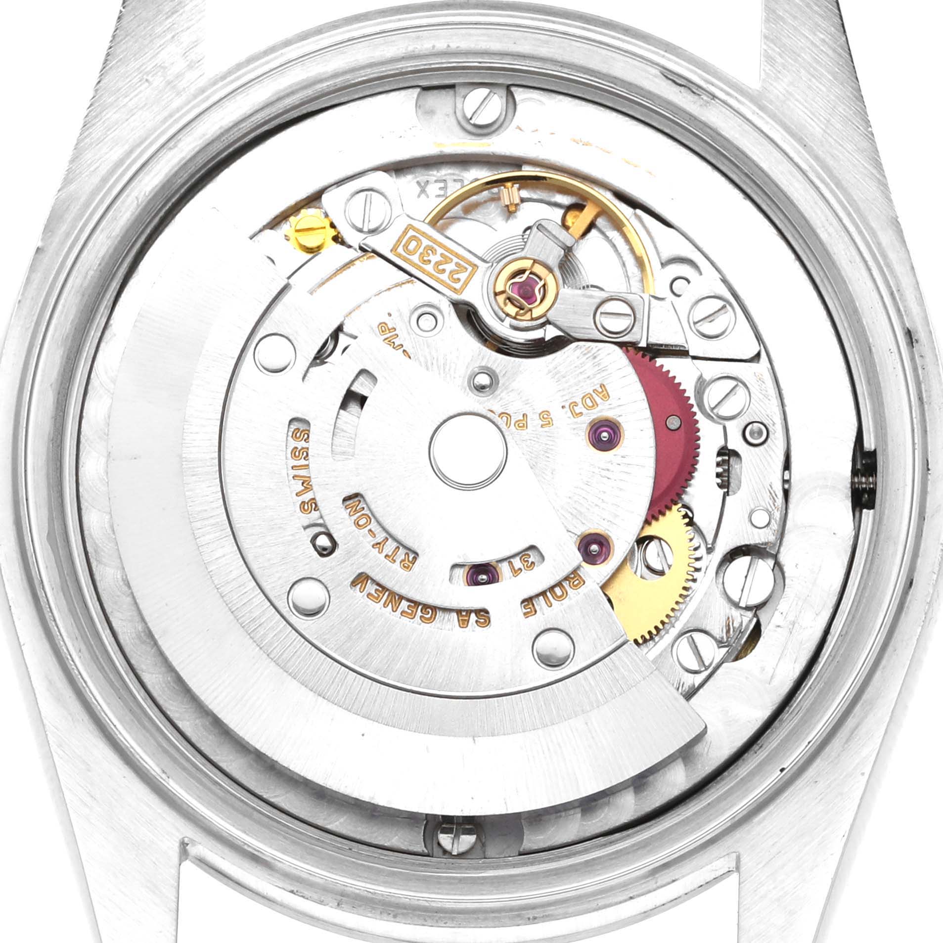 This image shows a close-up of the movement mechanism of a Rolex Mid-Size 77080 Women's Stainless Steel White Dial 77080 Women's Stainless Steel White Dial model watch.