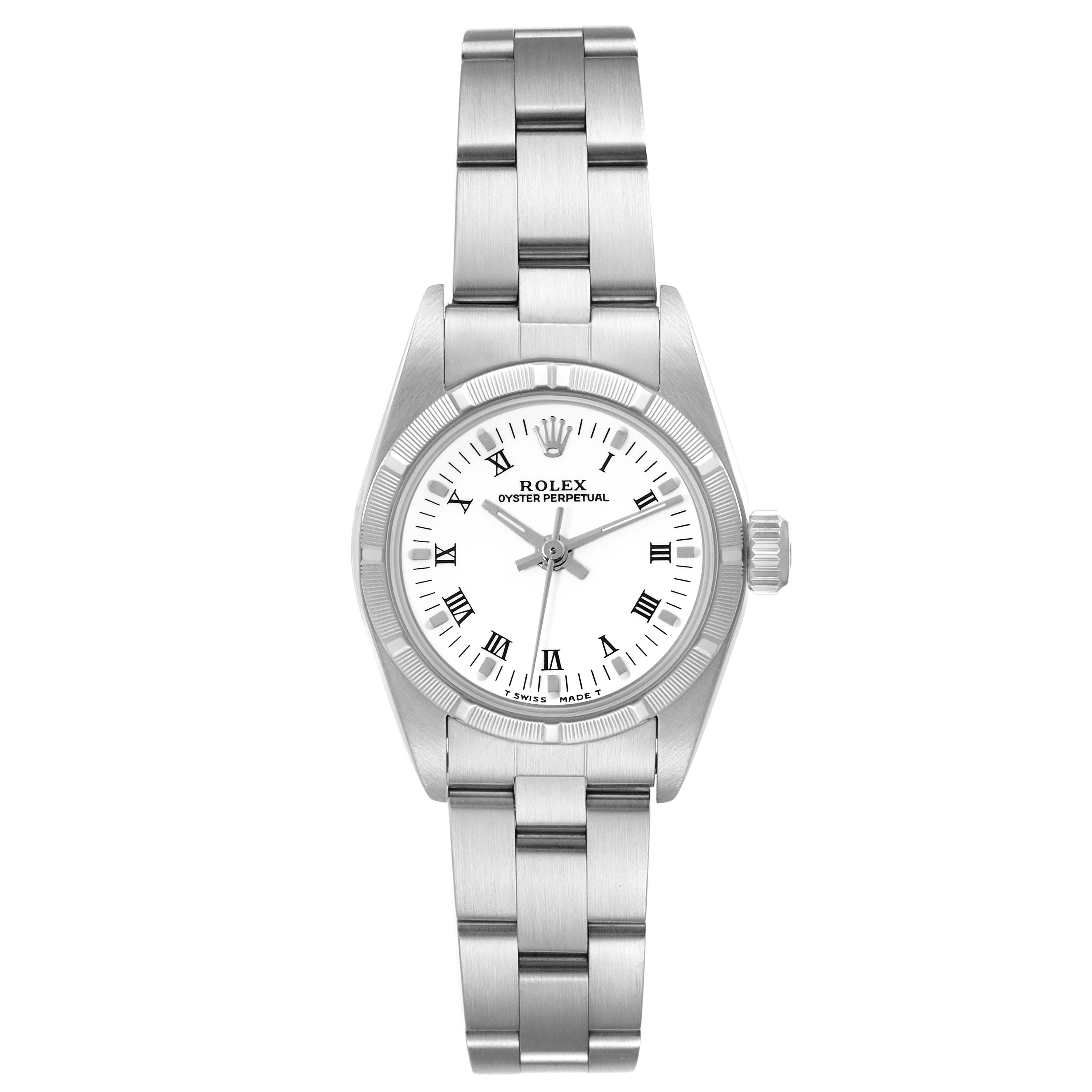 The image shows a front view of a Rolex Oyster Perpetual 67230 Women's Stainless Steel White Dial 67230 Women's Stainless Steel White Dial watch, displaying its stainless steel bracelet and white dial with Roman numerals.