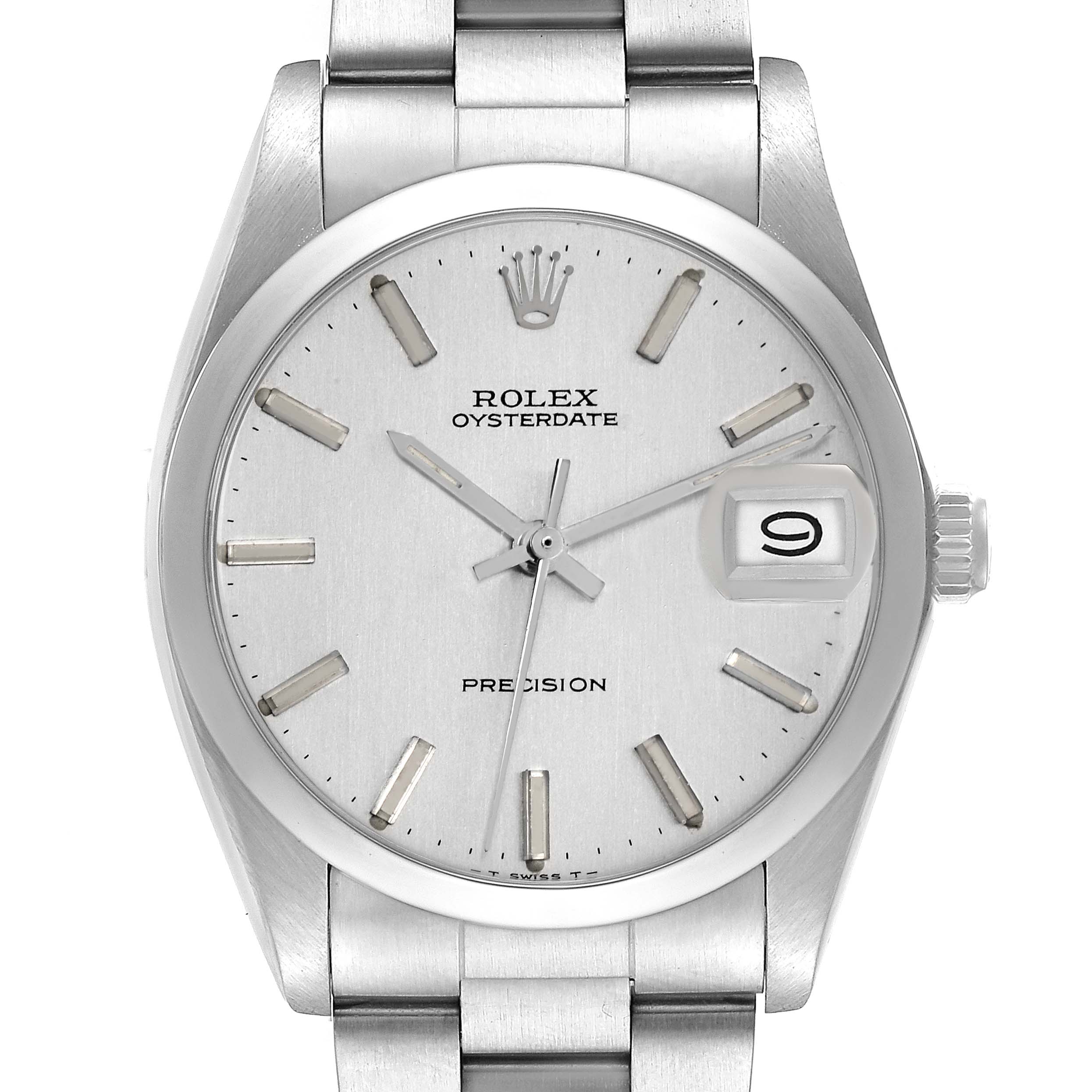The Rolex Vintage Collection model 6694 men's watch is shown from a front angle, highlighting the dial, hands, bezel, date window, and part of the bracelet.