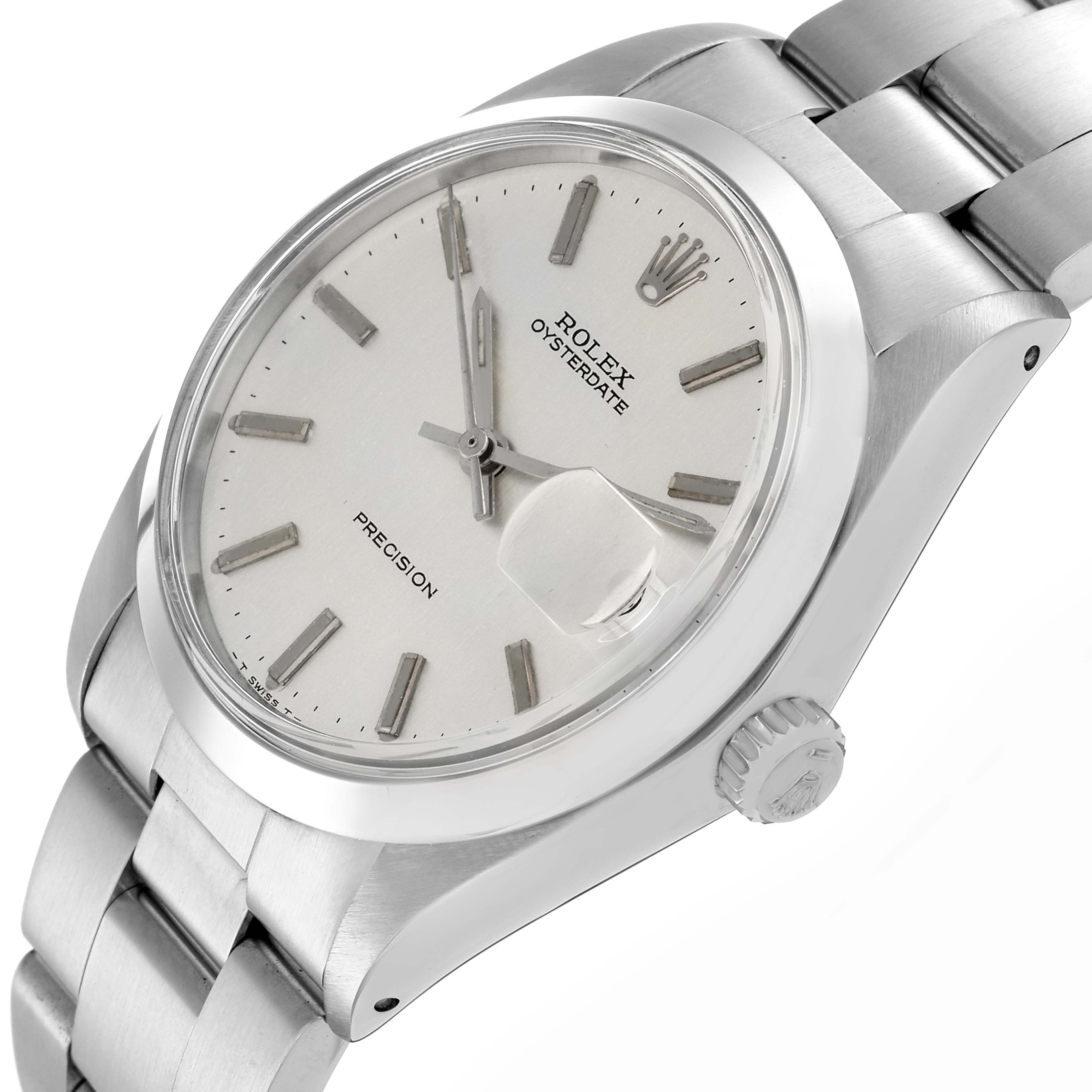 The image shows a Rolex Vintage Collection model 6694 men's watch at a slight angle, highlighting the white dial, markers, crown, and part of the bracelet.