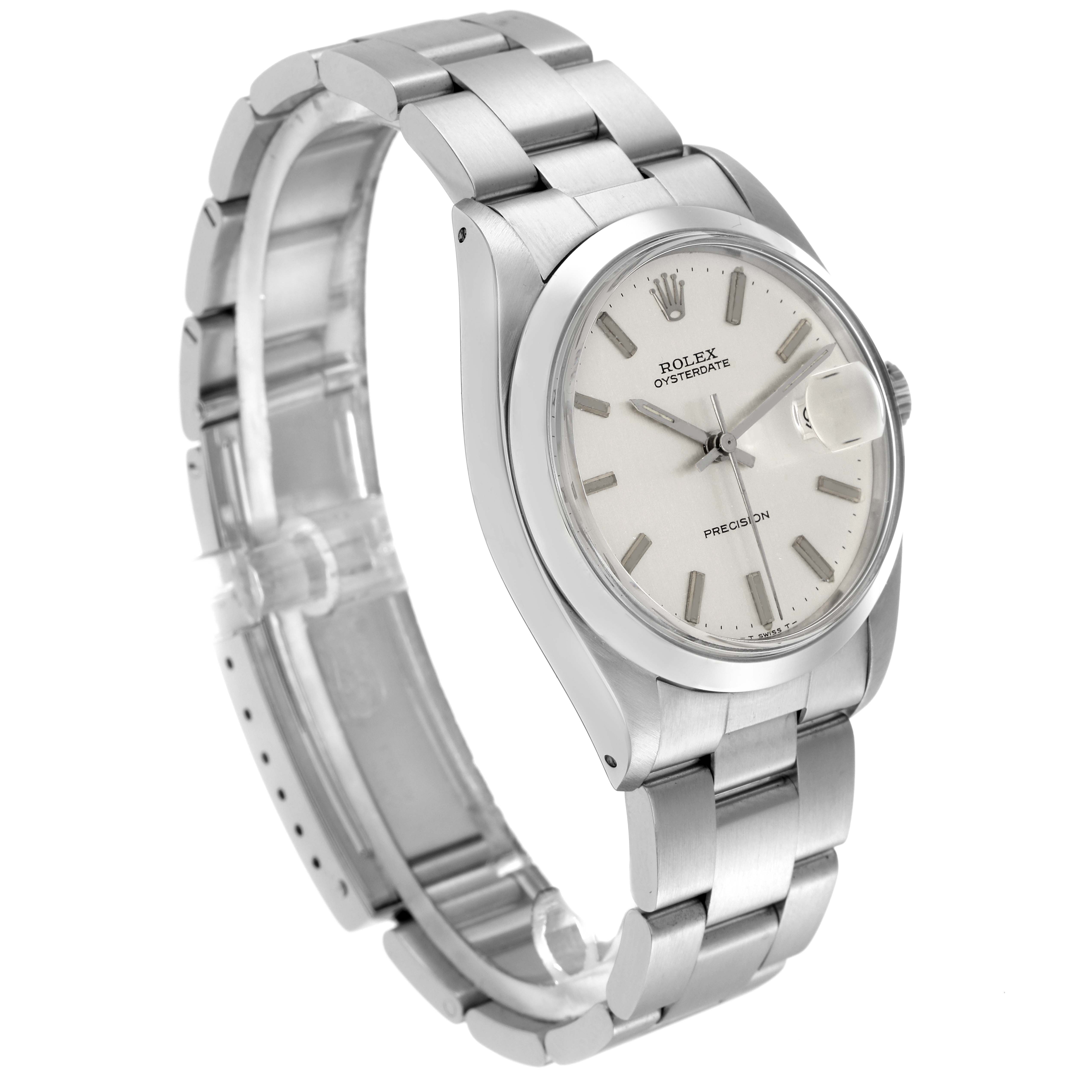 The image shows a Rolex Vintage Collection model 6694 men's watch at a three-quarter angle, highlighting the dial, bezel, and bracelet.