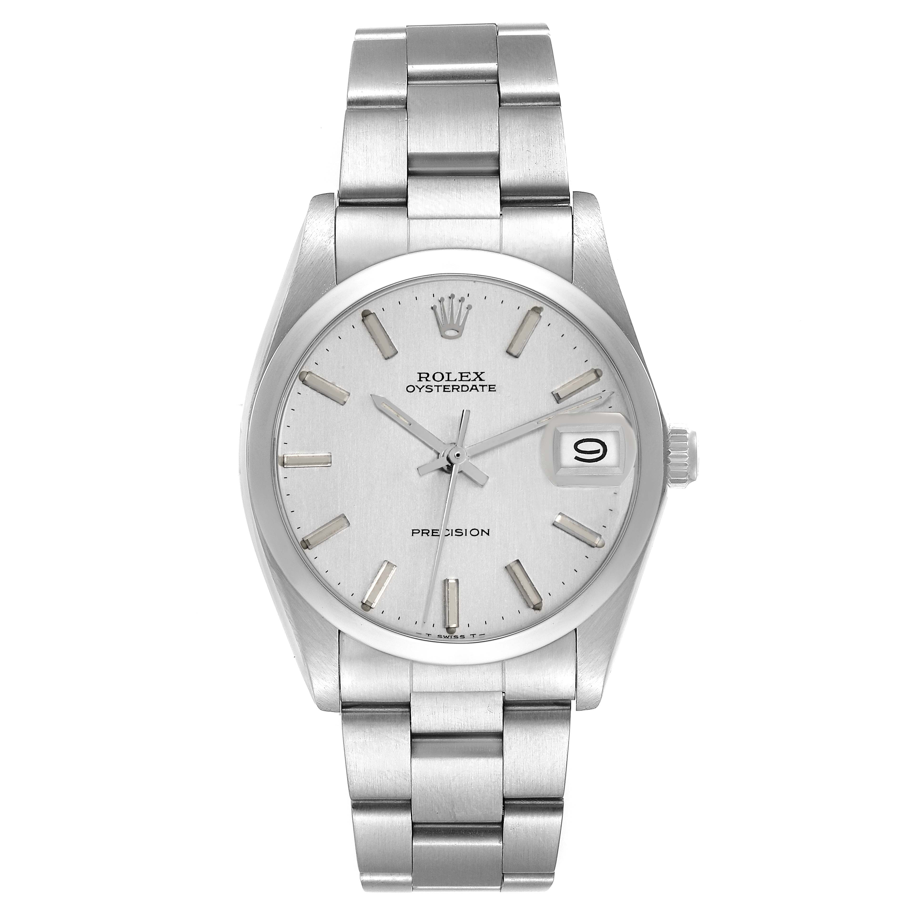The Rolex Vintage Collection model 6694 is shown from a front angle, displaying the dial, hands, markers, crown, and bracelet.