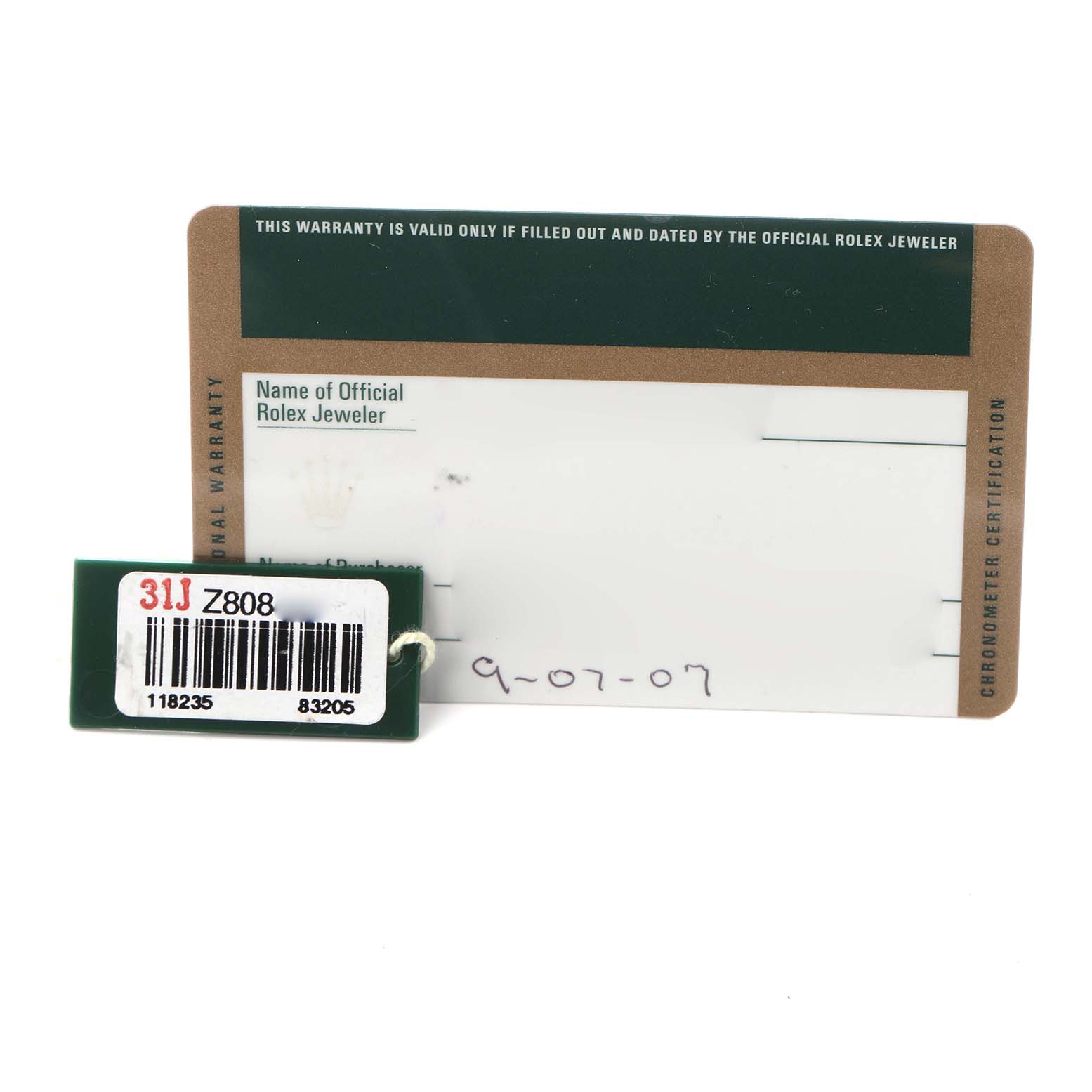 The image shows a warranty card and tag for the Rolex President model watch, model number 118235.