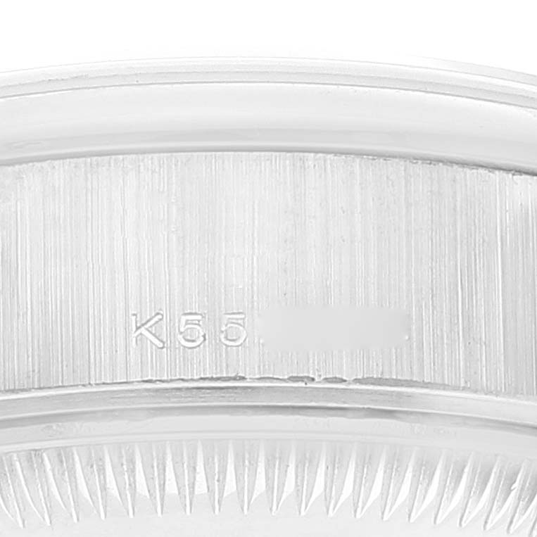 This image shows a close-up of the engraved serial number on the caseback of a Rolex President 79166 Women's Platinum Silver Dial 79166 Women's Platinum Silver Dial watch.