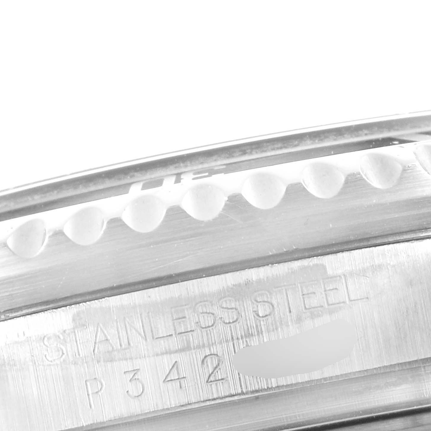 This image shows a close-up of the side of a Rolex Sea-Dweller 16600 Men
s Stainless Steel Black Dial 16600 Men
s Stainless Steel Black Dial watch, focusing on the stainless steel casing and a partial serial number.