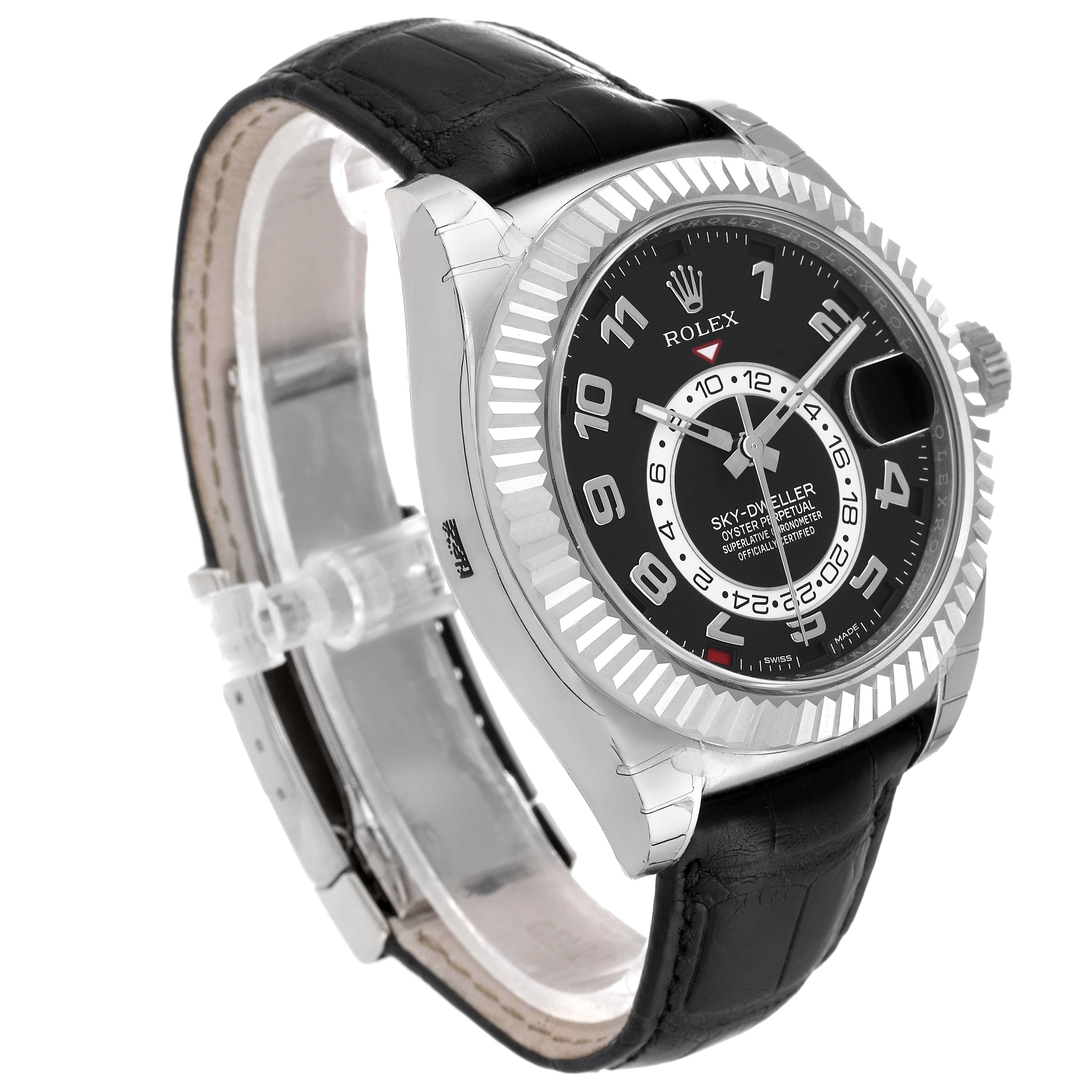 The image shows a Rolex Sky-Dweller 326139 Men's White Gold Black Dial 326139 Men's White Gold Black Dial watch at a slight angle, highlighting its black dial, fluted bezel, and leather strap.