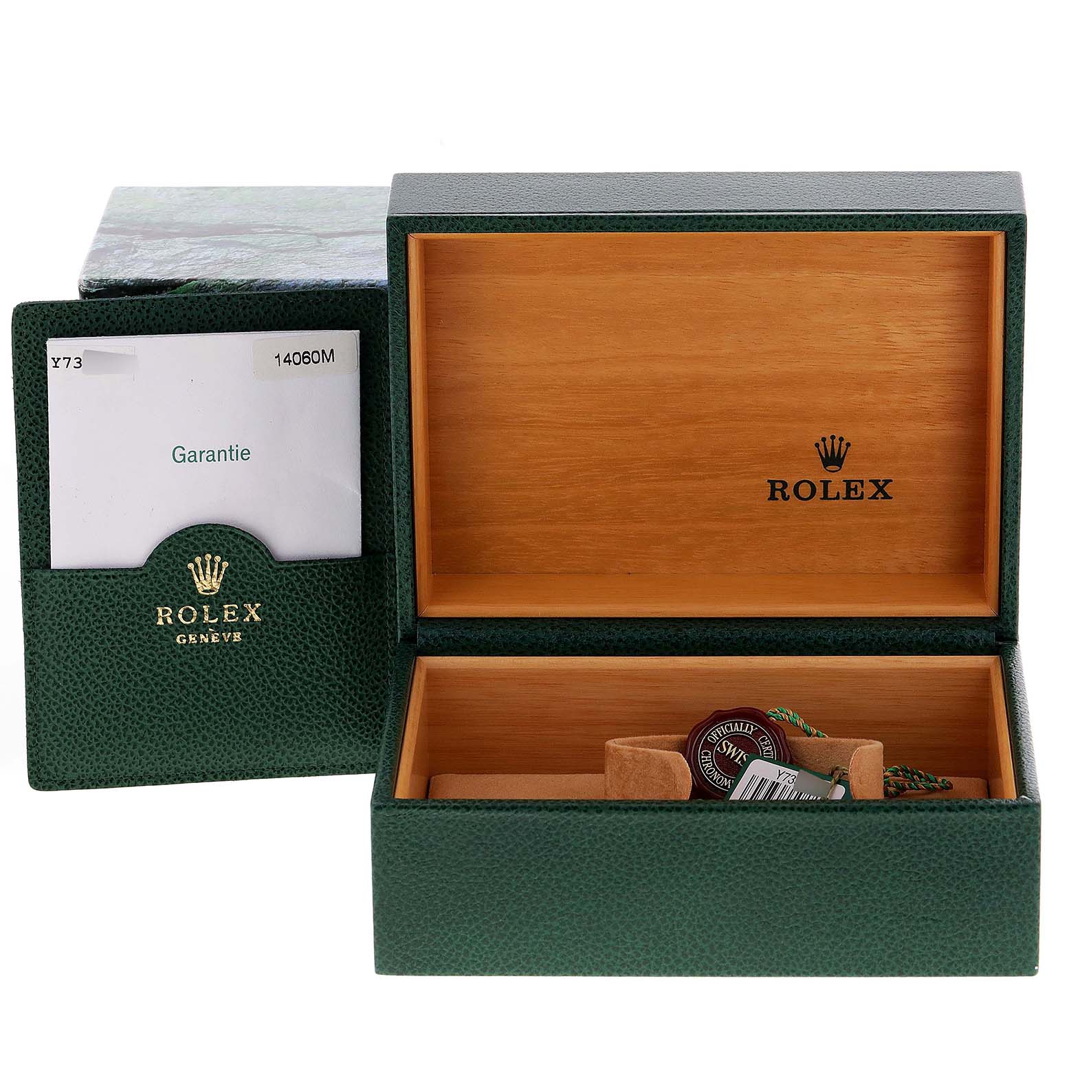 This image shows the open green box and warranty card holder for a Rolex Submariner 14060M Men
s Stainless Steel Black Dial 14060M Men
s Stainless Steel Black Dial watch.