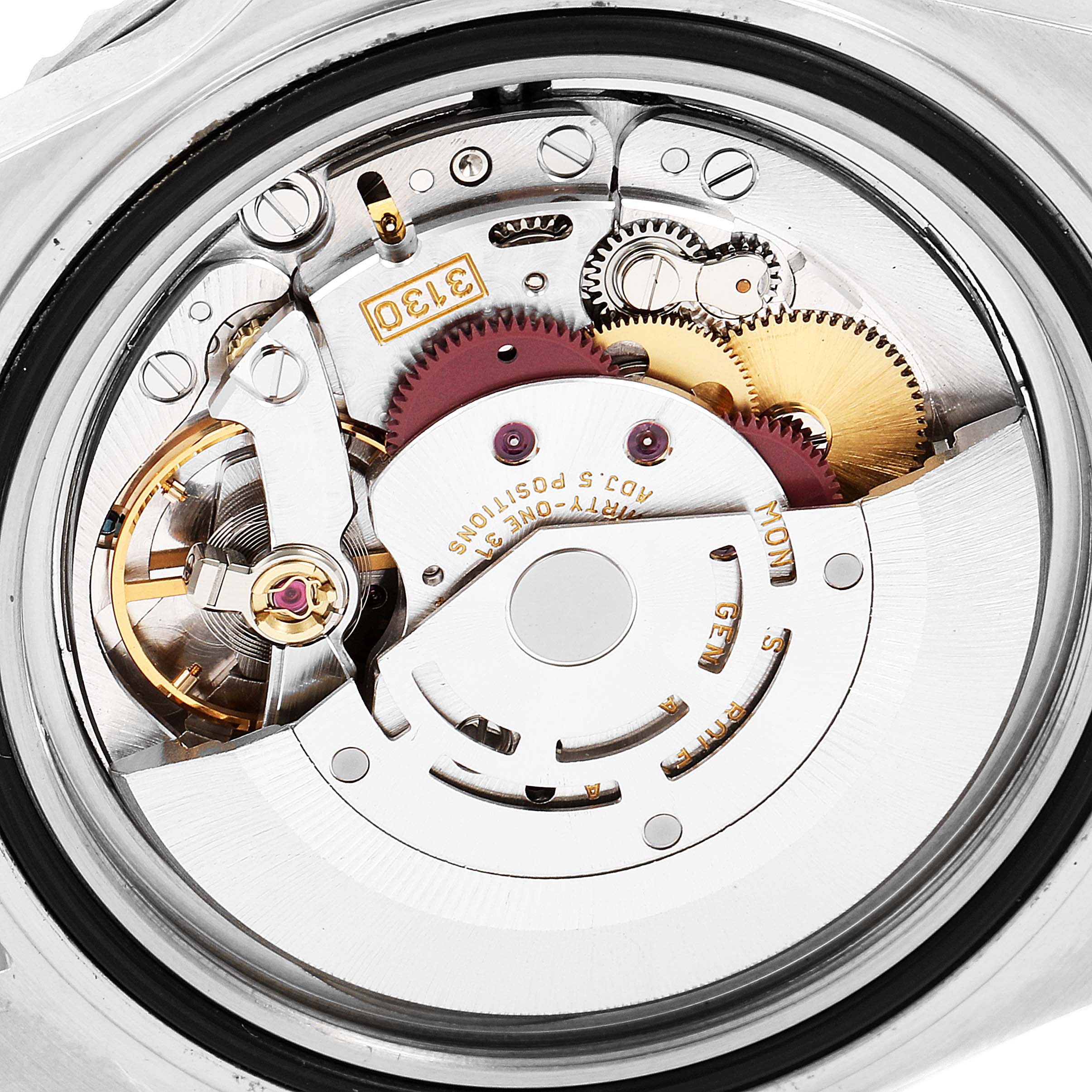 The image shows the inner mechanical movement of a Rolex Submariner 14060M Men
s Stainless Steel Black Dial 14060M Men
s Stainless Steel Black Dial watch, viewed from the back.