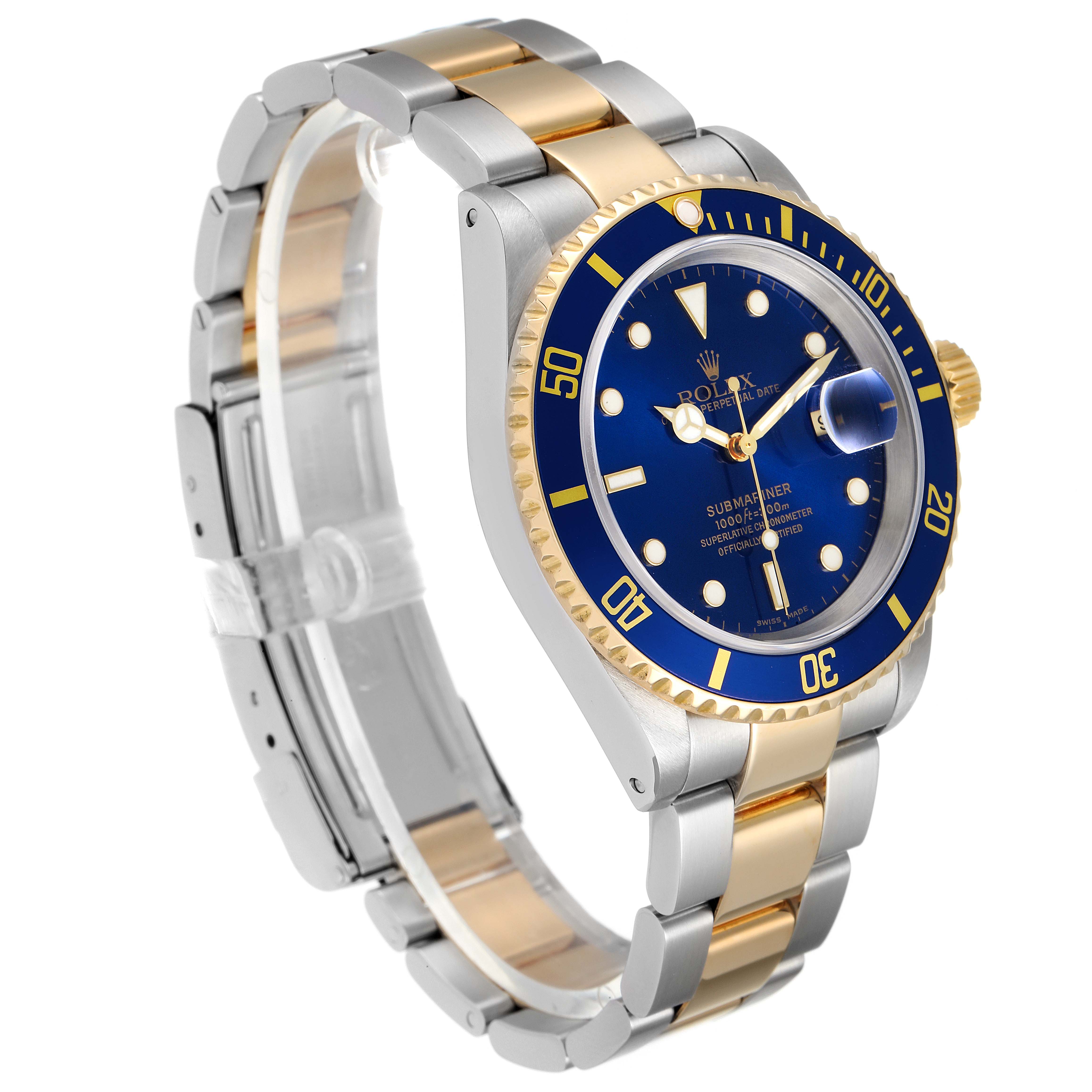 The angle shows the front and left side of the Rolex Submariner 16613 Men
s Steel and Gold (two tone) Blue Dial 16613 Men
s Steel and Gold (two tone) Blue Dial, highlighting the blue dial, gold bezel, and two-tone bracelet.