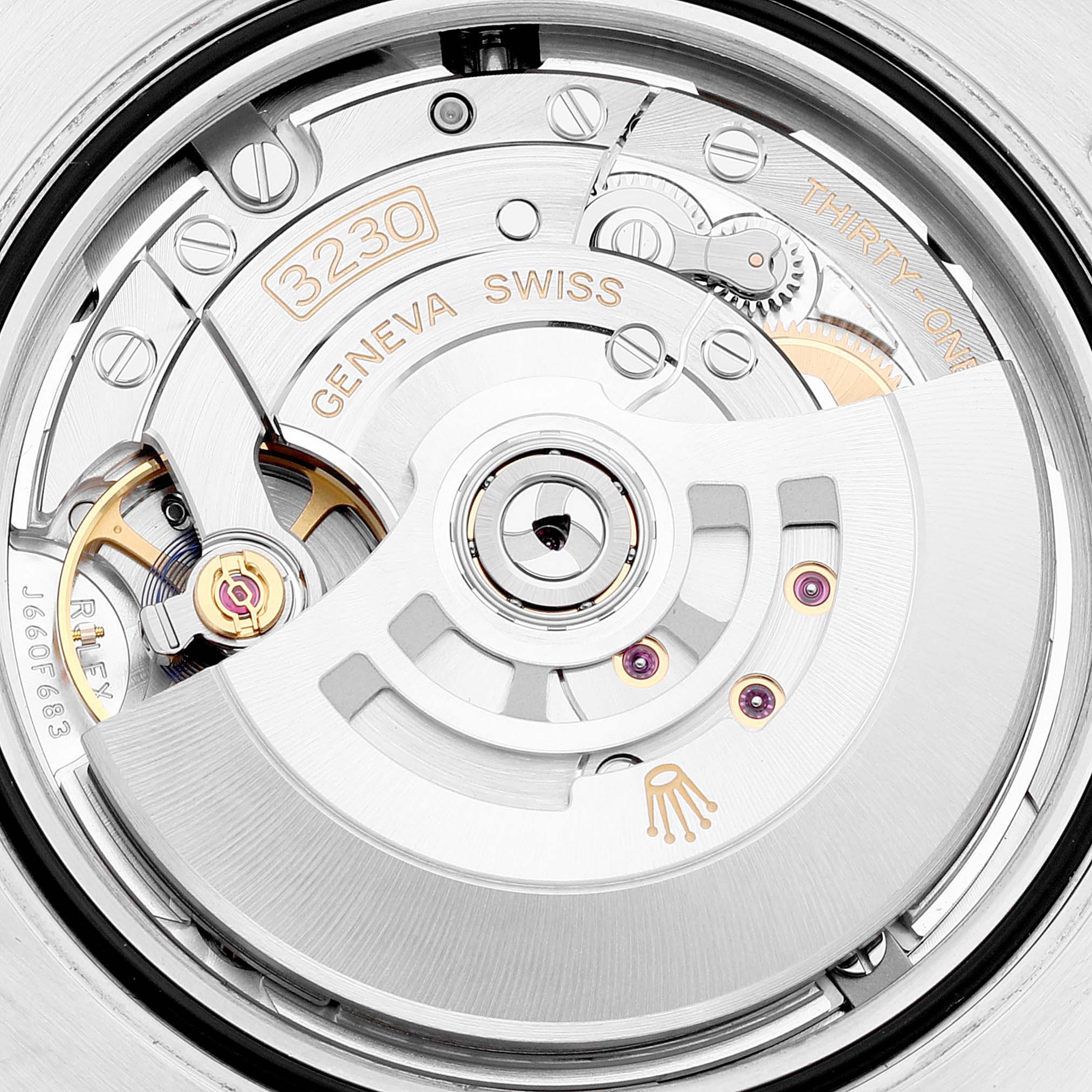 This image shows the movement parts of a Rolex Submariner 124060 Men
s Stainless Steel Black Dial 124060 Men
s Stainless Steel Black Dial watch from a close-up, top-down angle.