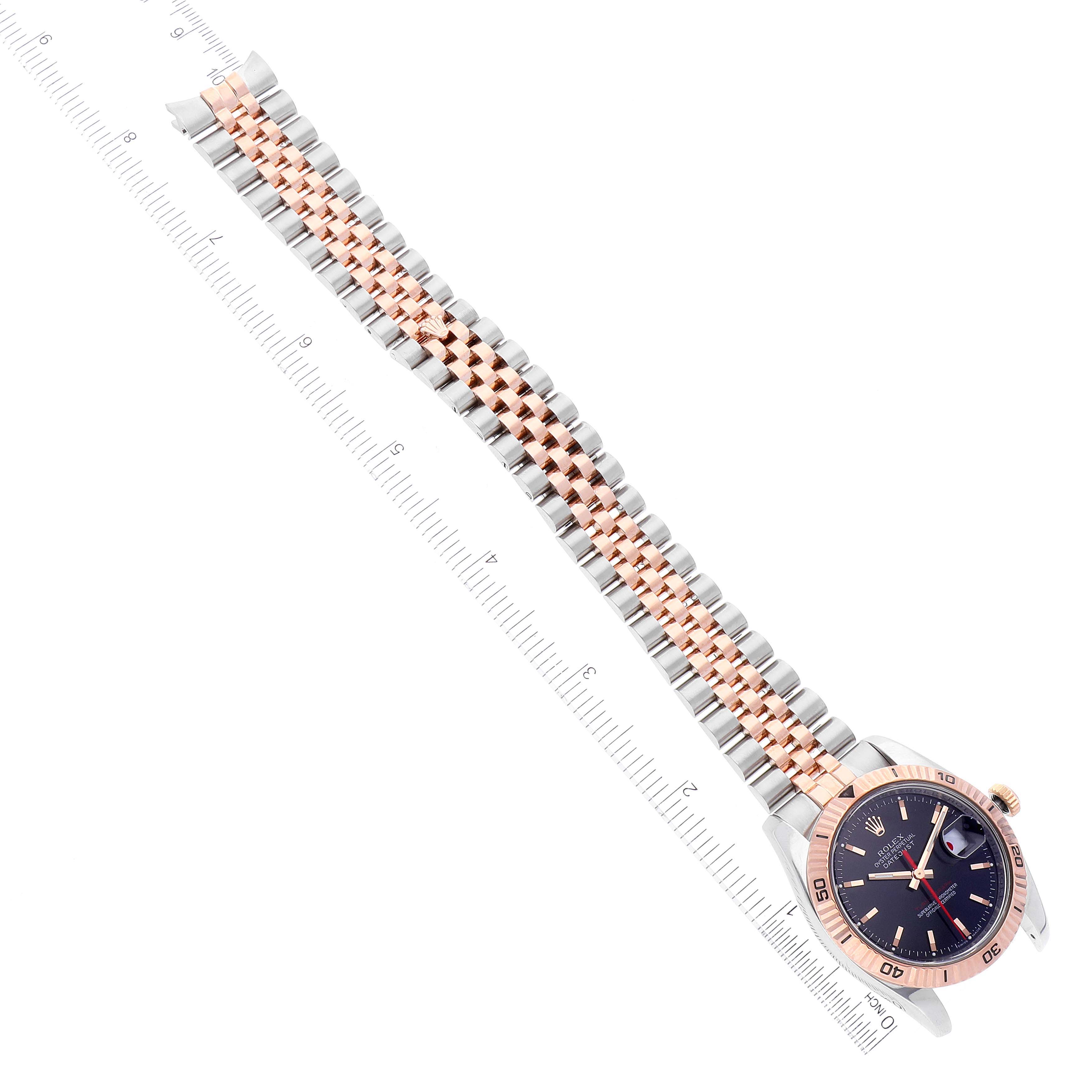 The Rolex Turn-o-Graph 116261 Men's Steel and Gold (two tone) Black Dial 116261 Men's Steel and Gold (two tone) Black Dial model watch is shown from a top view, displaying its face, bezel, and bracelet.