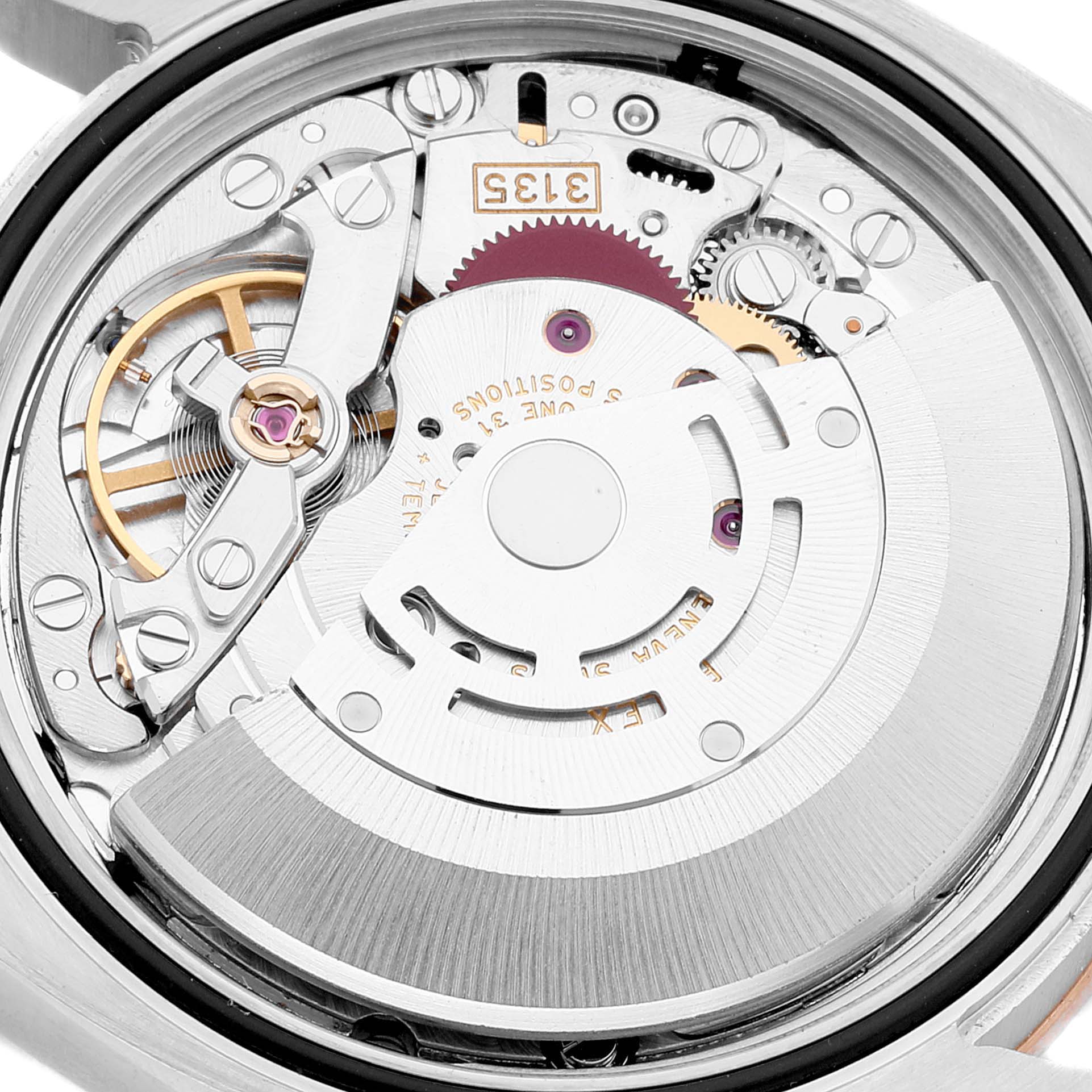 The image shows the movement and internal mechanism of a Turn-o-Graph model watch by Rolex from a close-up angle.