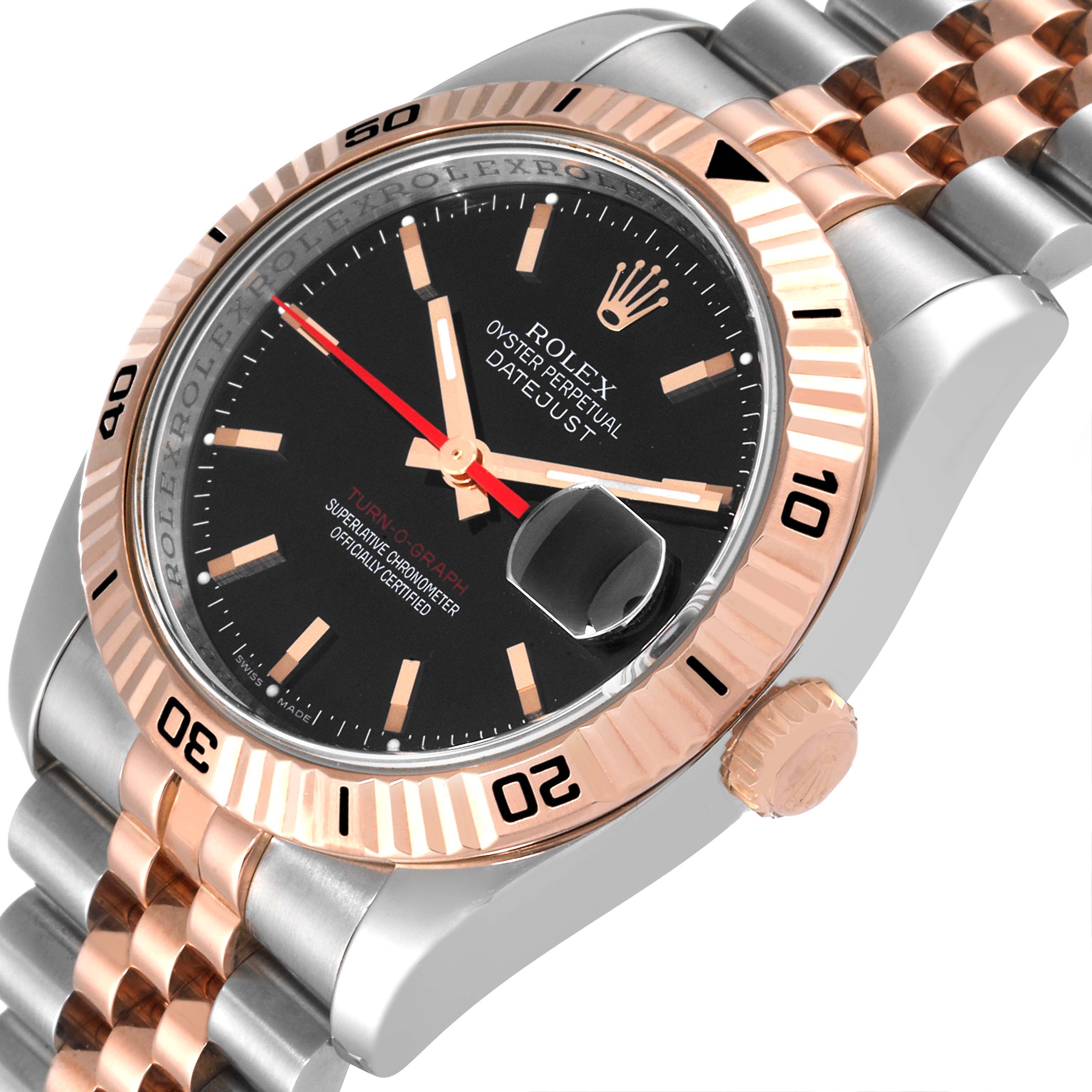 The image shows a close-up angle of the Rolex Turn-o-Graph 116261 Men's Steel and Gold (two tone) Black Dial 116261 Men's Steel and Gold (two tone) Black Dial watch, highlighting its bezel, dial, date magnifier, and two-tone Jubilee bracelet.