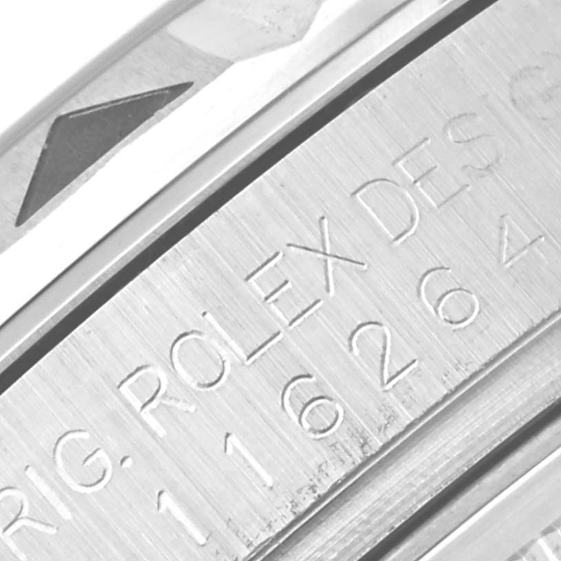 This close-up image shows the engraved bezel and case of a Rolex Turn-o-Graph 116264 Men's Stainless Steel Black Dial 116264 Men's Stainless Steel Black Dial watch.