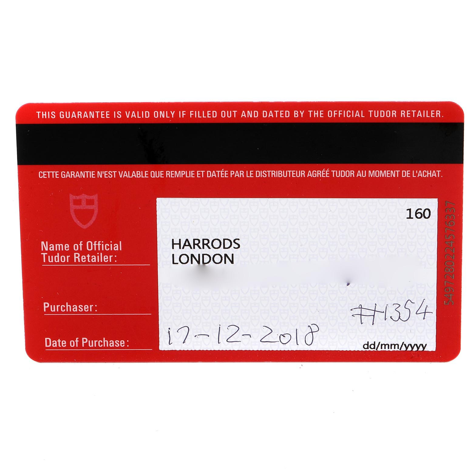 This image shows a warranty card for the Tudor Heritage Black Bay 79230G Men
s Stainless Steel Black Dial 79230G Men
s Stainless Steel Black Dial watch issued by Harrods, London.