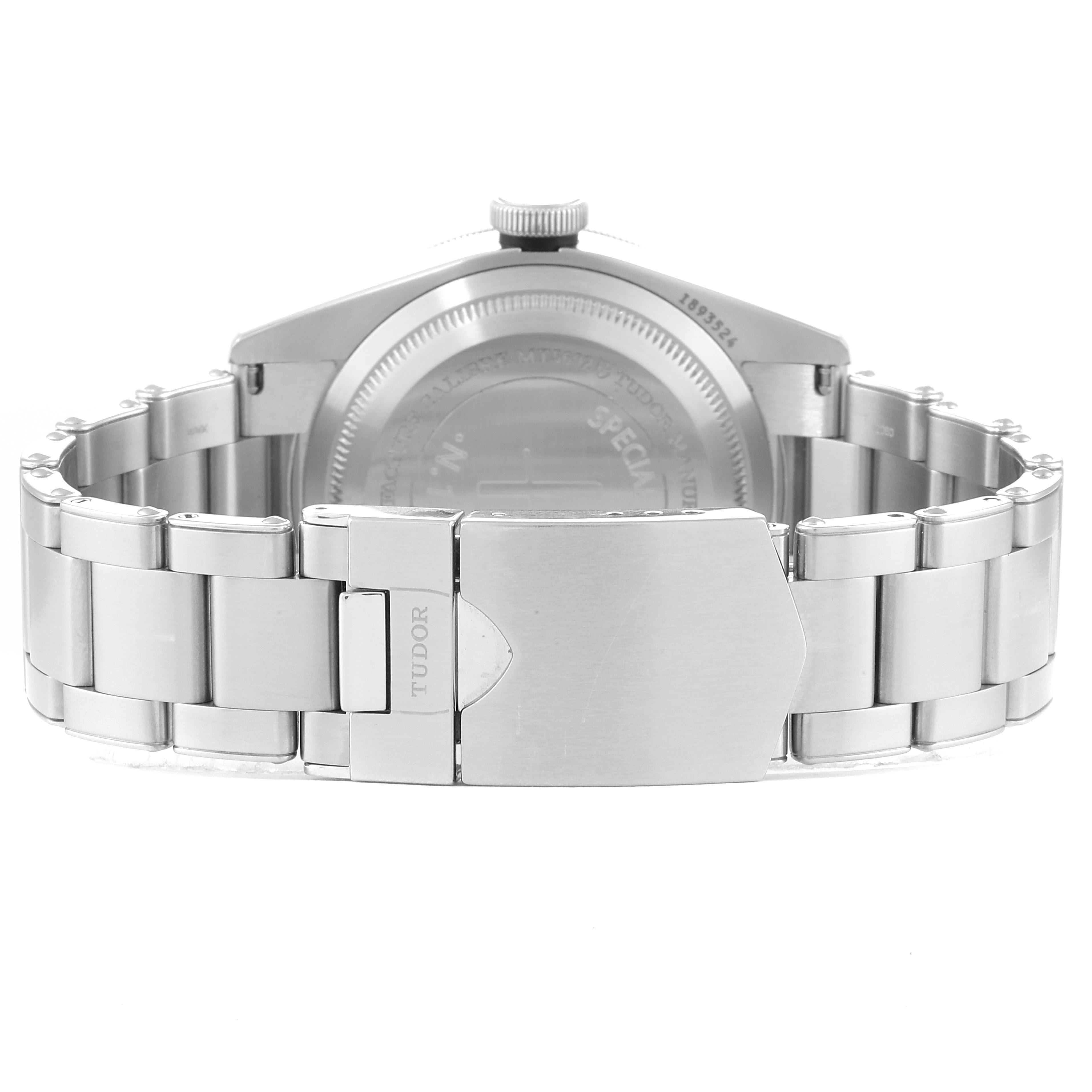 This image shows the back view of the Tudor Heritage Black Bay 79230G Men
s Stainless Steel Black Dial 79230G Men
s Stainless Steel Black Dial watch, highlighting its stainless steel bracelet and clasp.