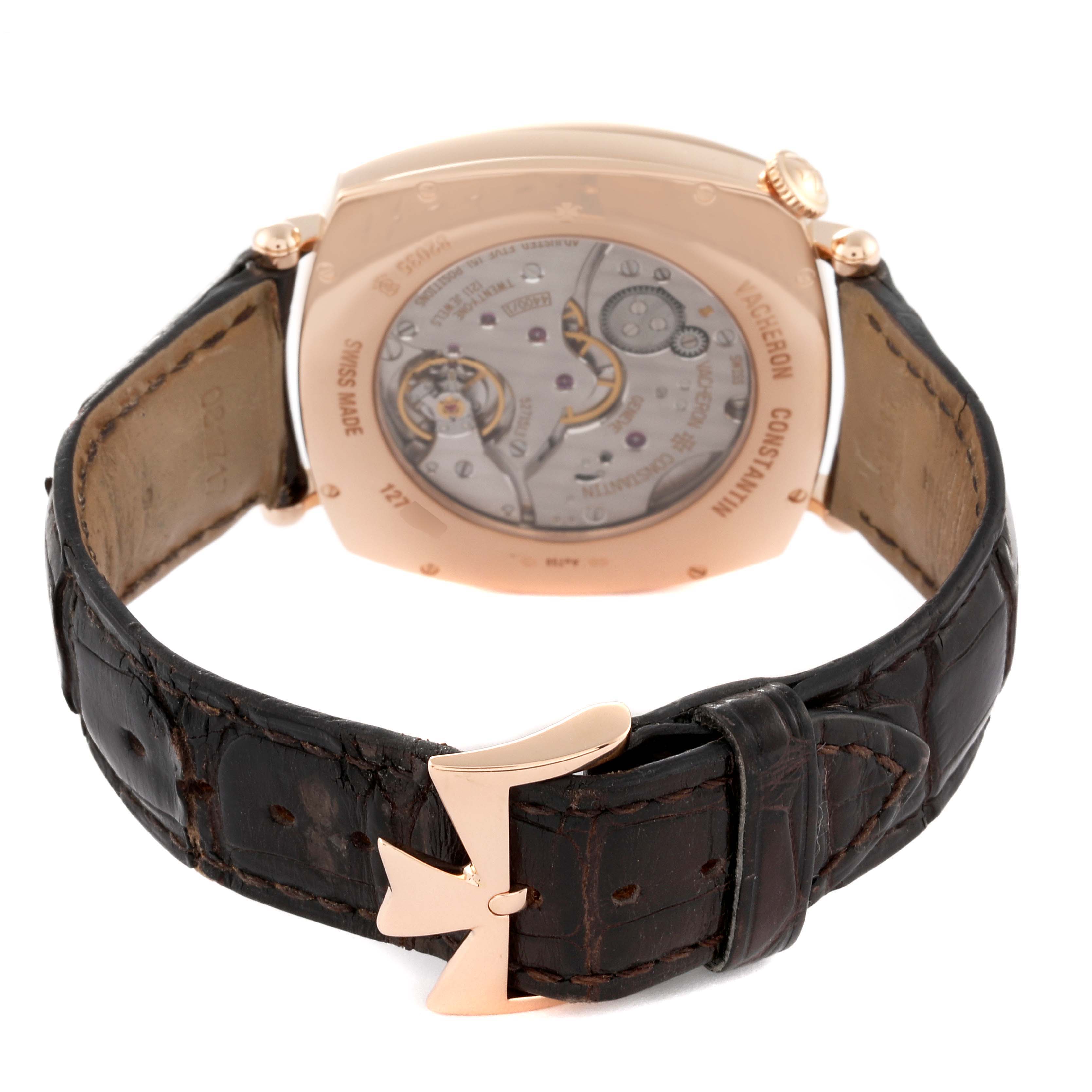 This image shows the back of the Vacheron Constantin Historiques 82035000R-9359 Men's Rose Gold Silver Dial 82035000R-9359 Men's Rose Gold Silver Dial watch, highlighting its movement and brown leather strap.