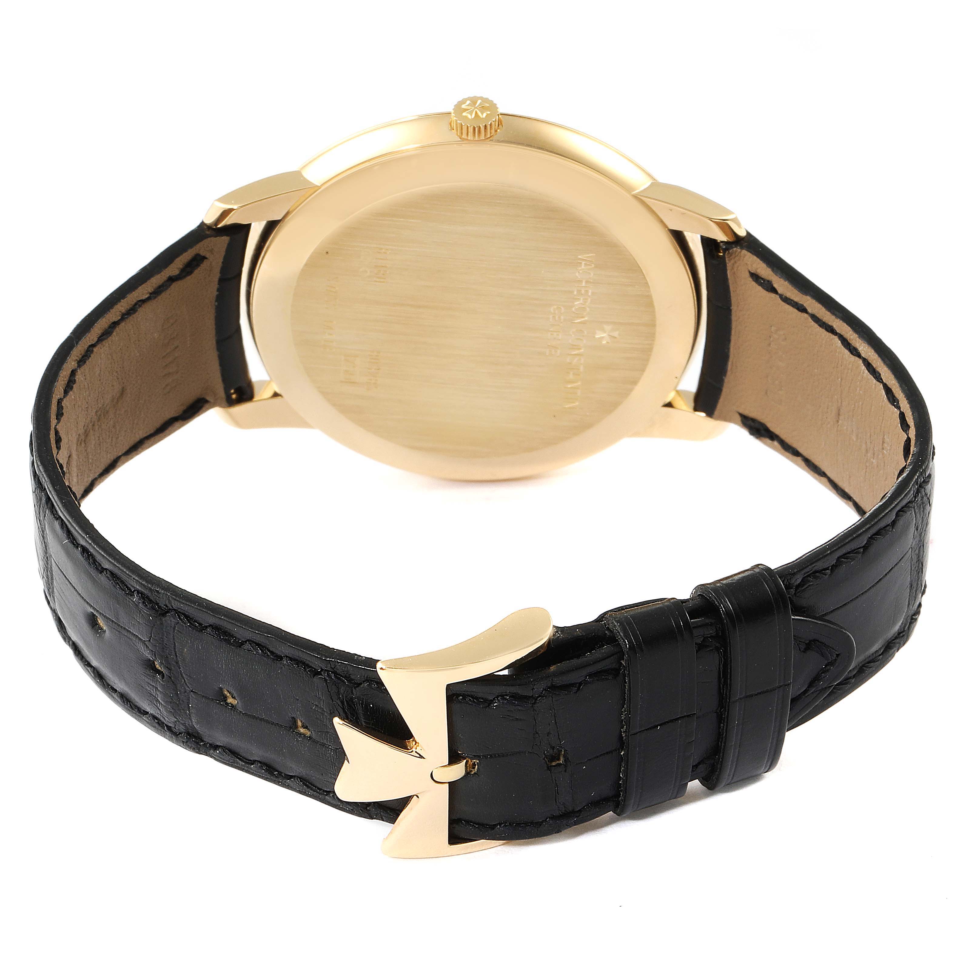 The image shows the back view of a Vacheron Constantin Patrimony 81180 Men's Yellow Gold Silver Dial 81180 Men's Yellow Gold Silver Dial watch, highlighting its case back, lugs, strap, and buckle.