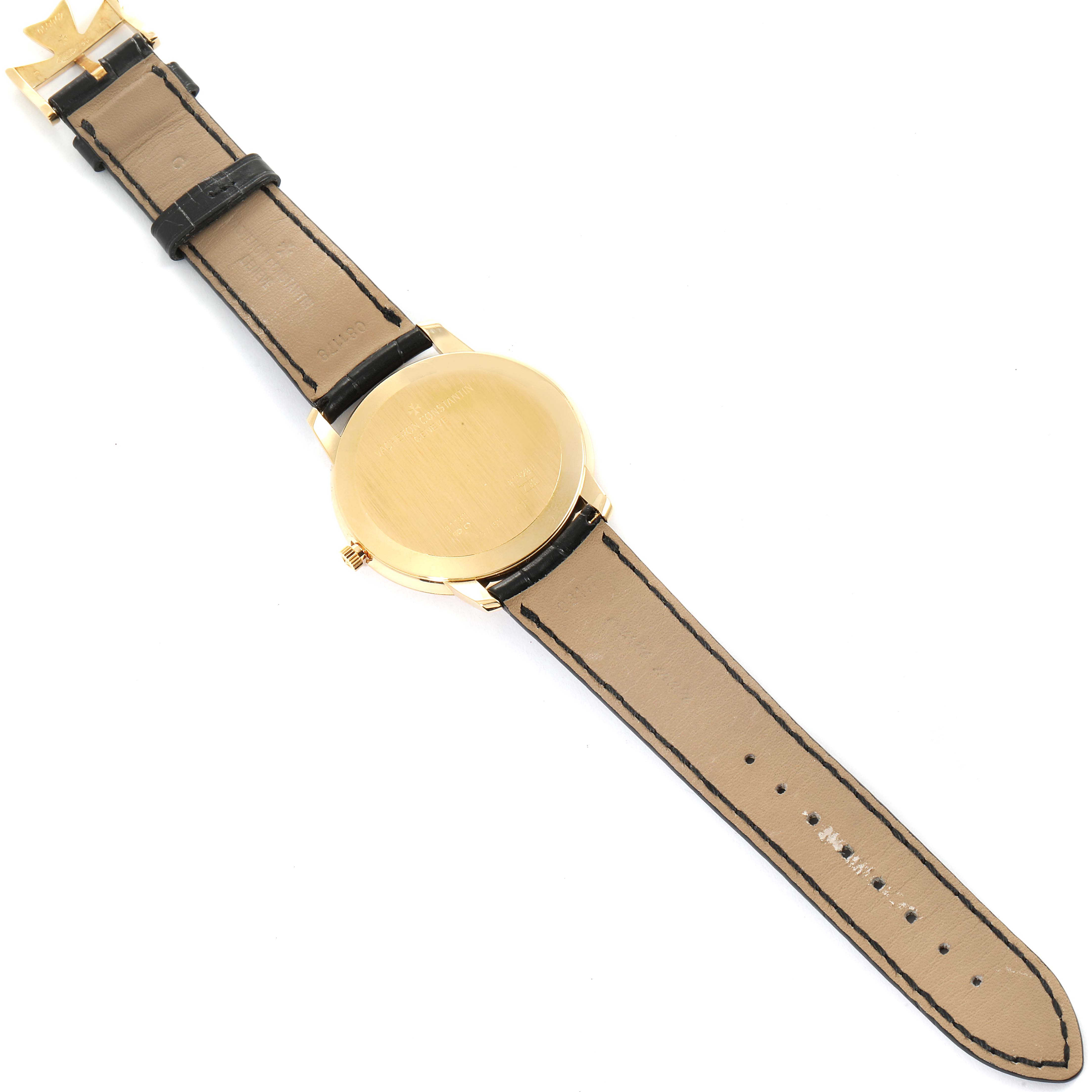 This is a Patrimony model by Vacheron Constantin shown from the back, displaying the case back and both straps.