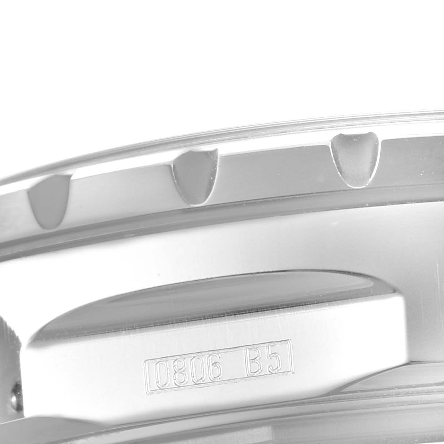 The image shows a close-up of the bezel and case of a Breitling Chronomatic A41360 Men's Stainless Steel Black Dial A41360 Men's Stainless Steel Black Dial watch.