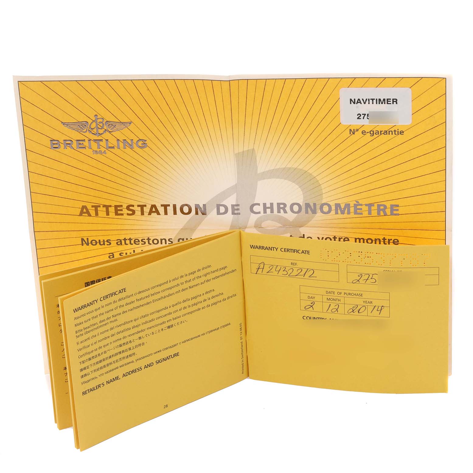 The image shows the warranty certificates and chronometer attestation for a Breitling Navitimer A24322 Men
s Stainless Steel Black Dial A24322 Men
s Stainless Steel Black Dial.