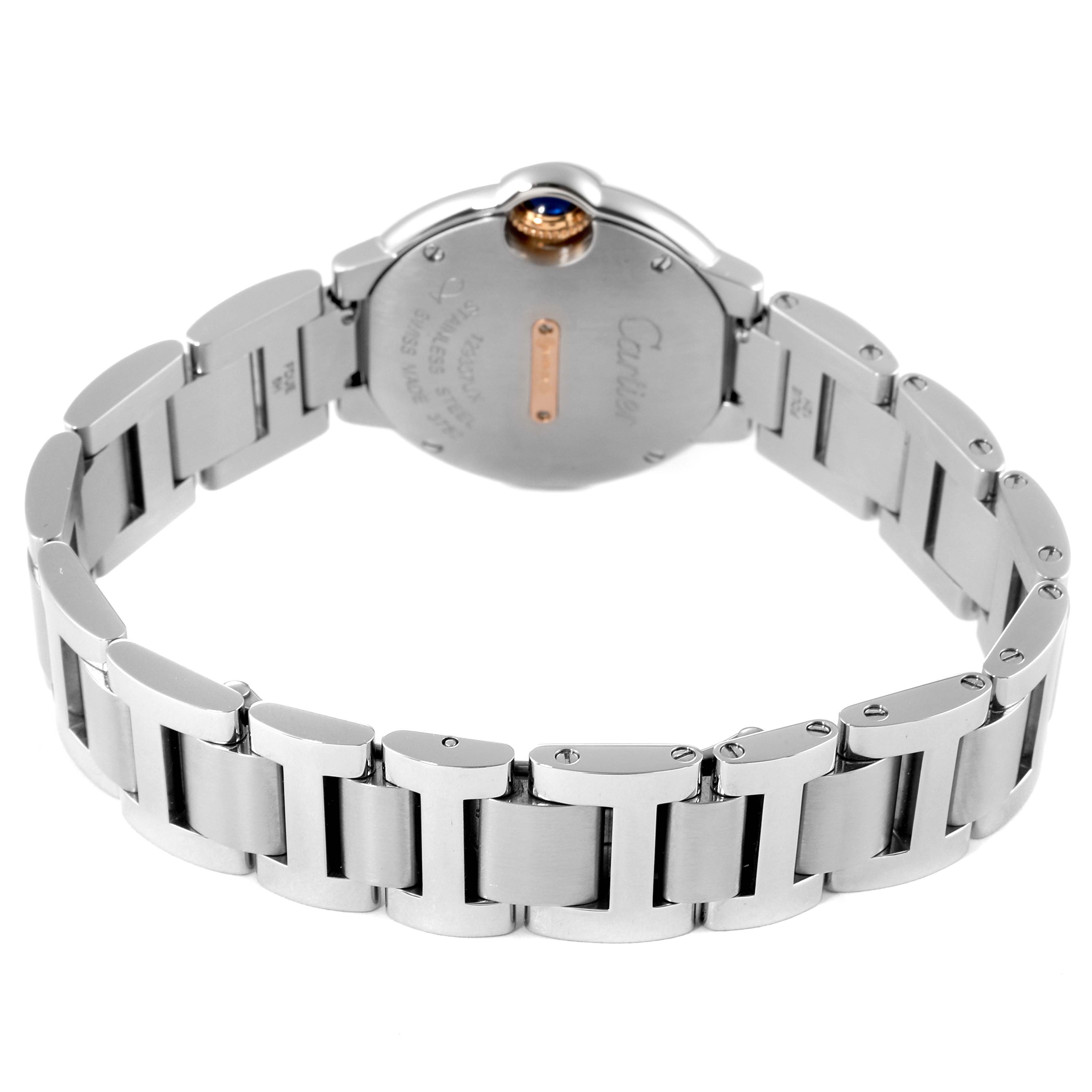 The image shows the back view of a Cartier Ballon Bleu WE902079 Women's Steel and Gold (two tone) Silver Dial WE902079 Women's Steel and Gold (two tone) Silver Dial watch, highlighting the case back and metallic bracelet.