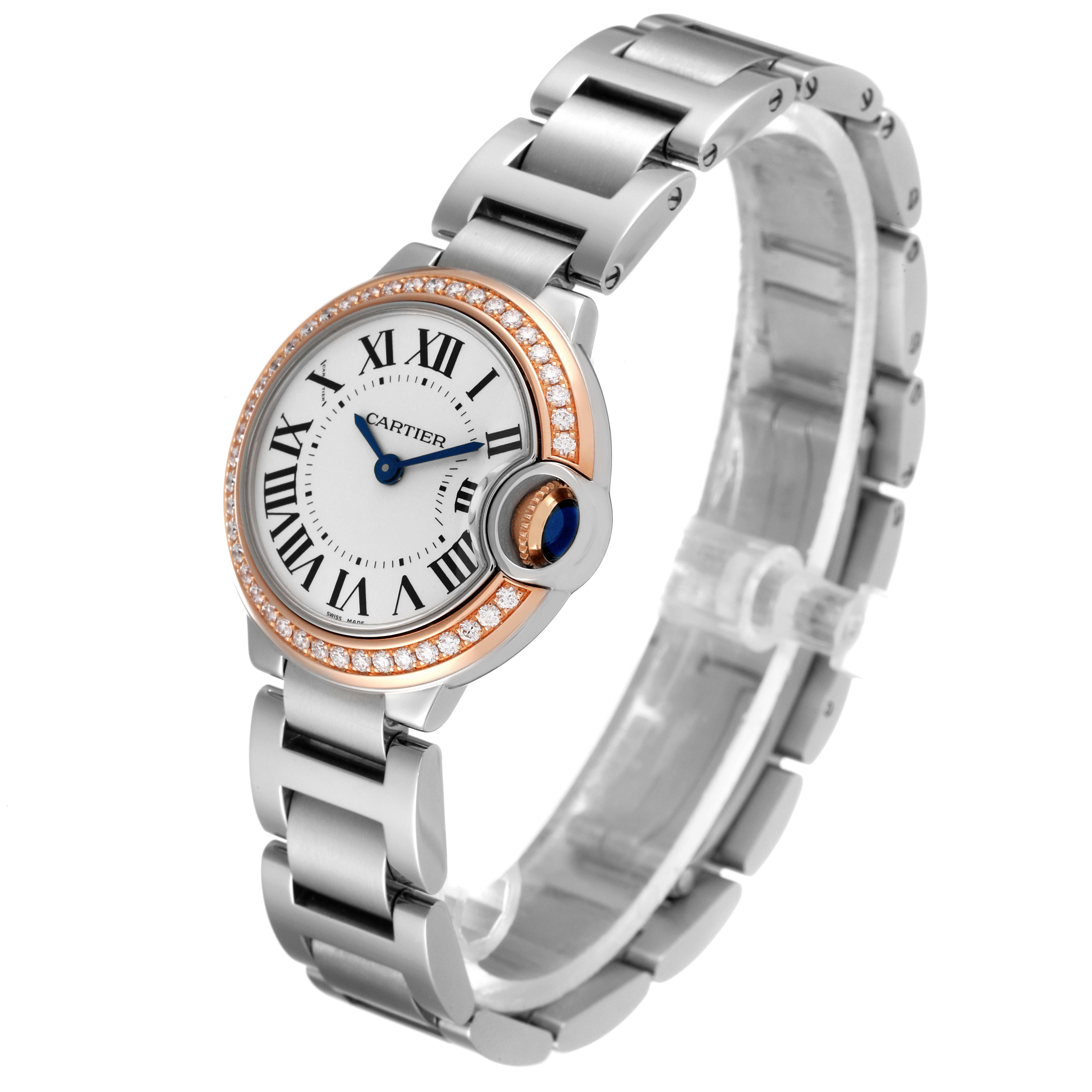 The image shows a Ballon Bleu model by Cartier at a slight angle, focusing on the face, bezel, and part of the bracelet.