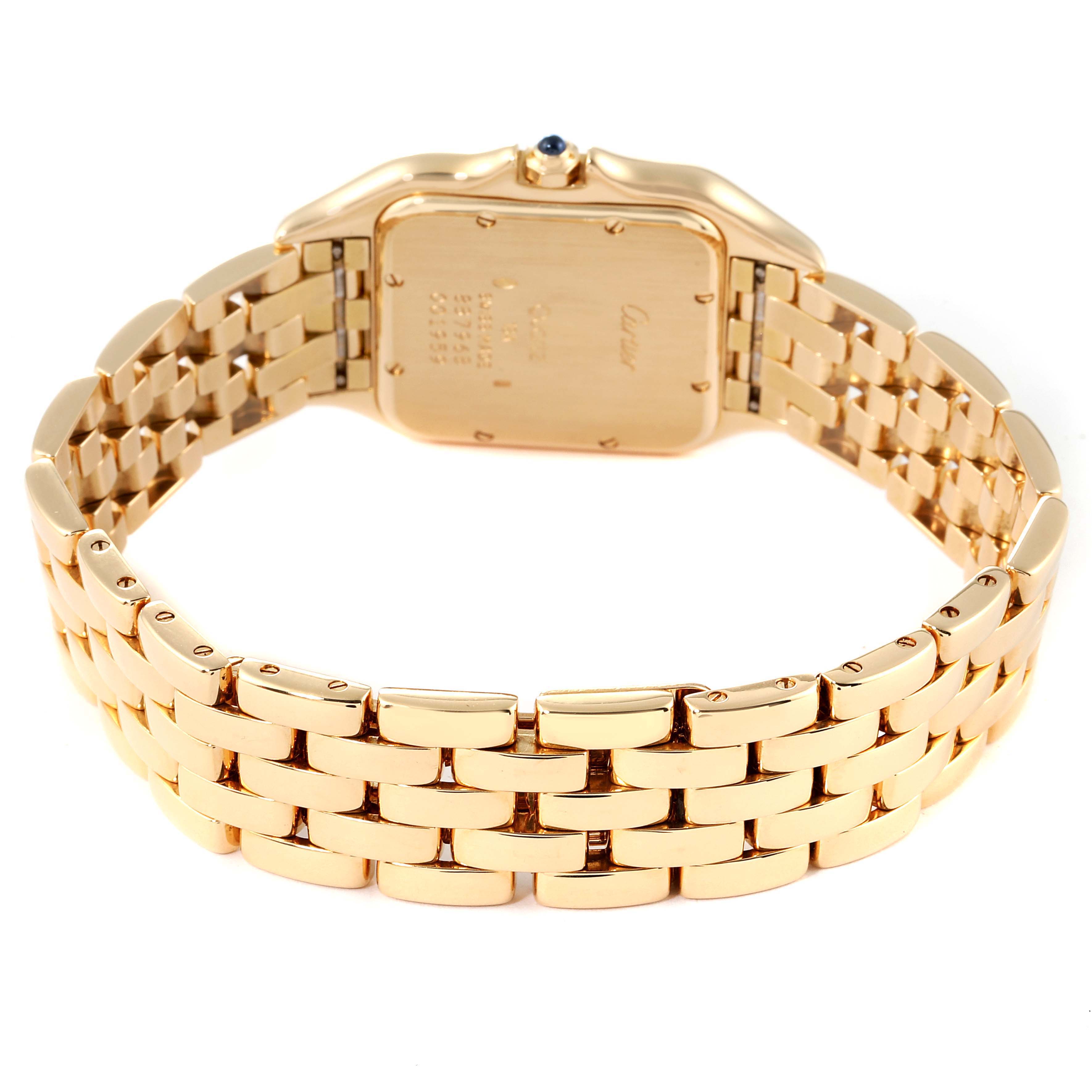 The Cartier Panthère watch is shown from the back, highlighting the caseback and the gold bracelet.