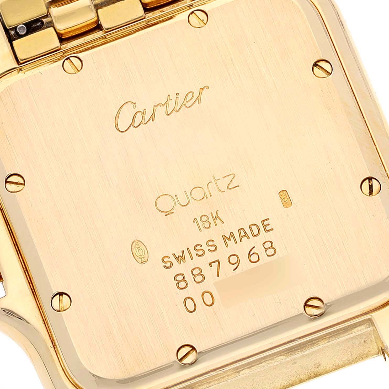 This image shows the back case of a Cartier Panthere W2501489 Men
s Yellow Gold Silver Dial W2501489 Men
s Yellow Gold Silver Dial watch, highlighting its engravings and screws.