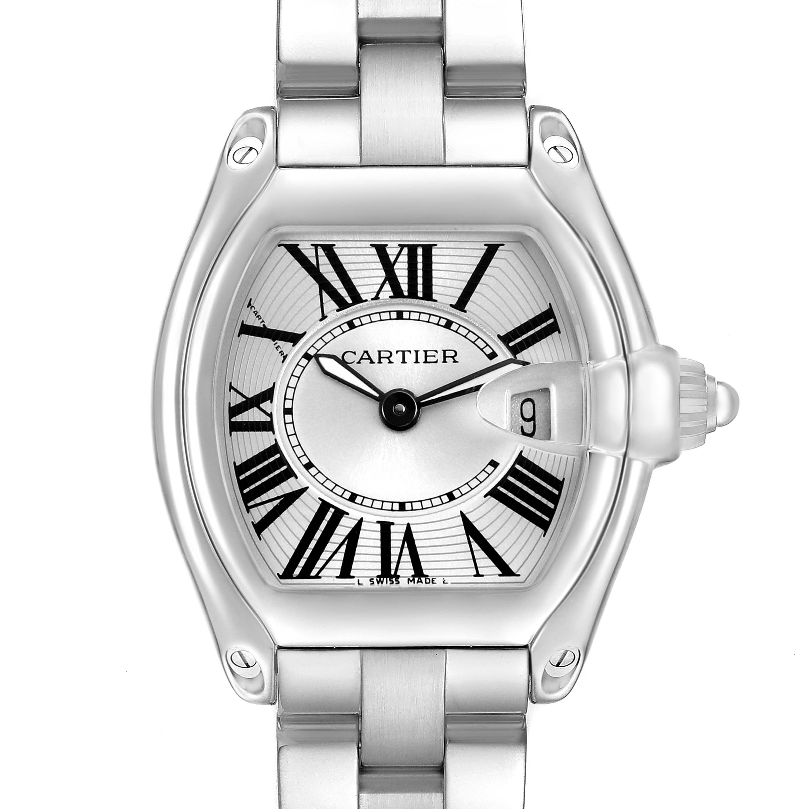 The Cartier Roadster W62016V3 Women's Stainless Steel Silver Dial watch is shown from a front angle, displaying the dial, Roman numerals, and date window.