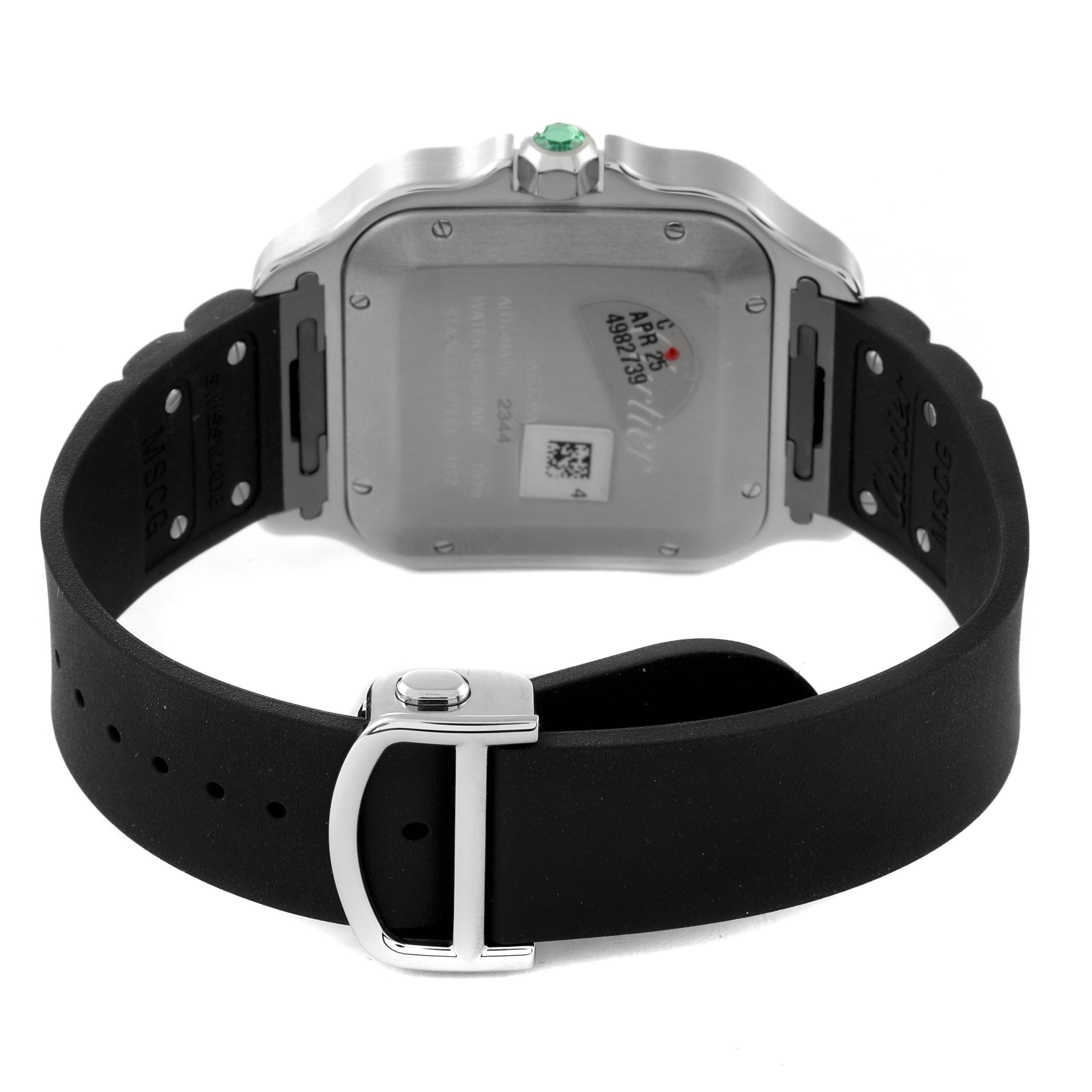 This image shows the back view of a Santos model by Cartier, including its case back, crown, and black rubber strap.