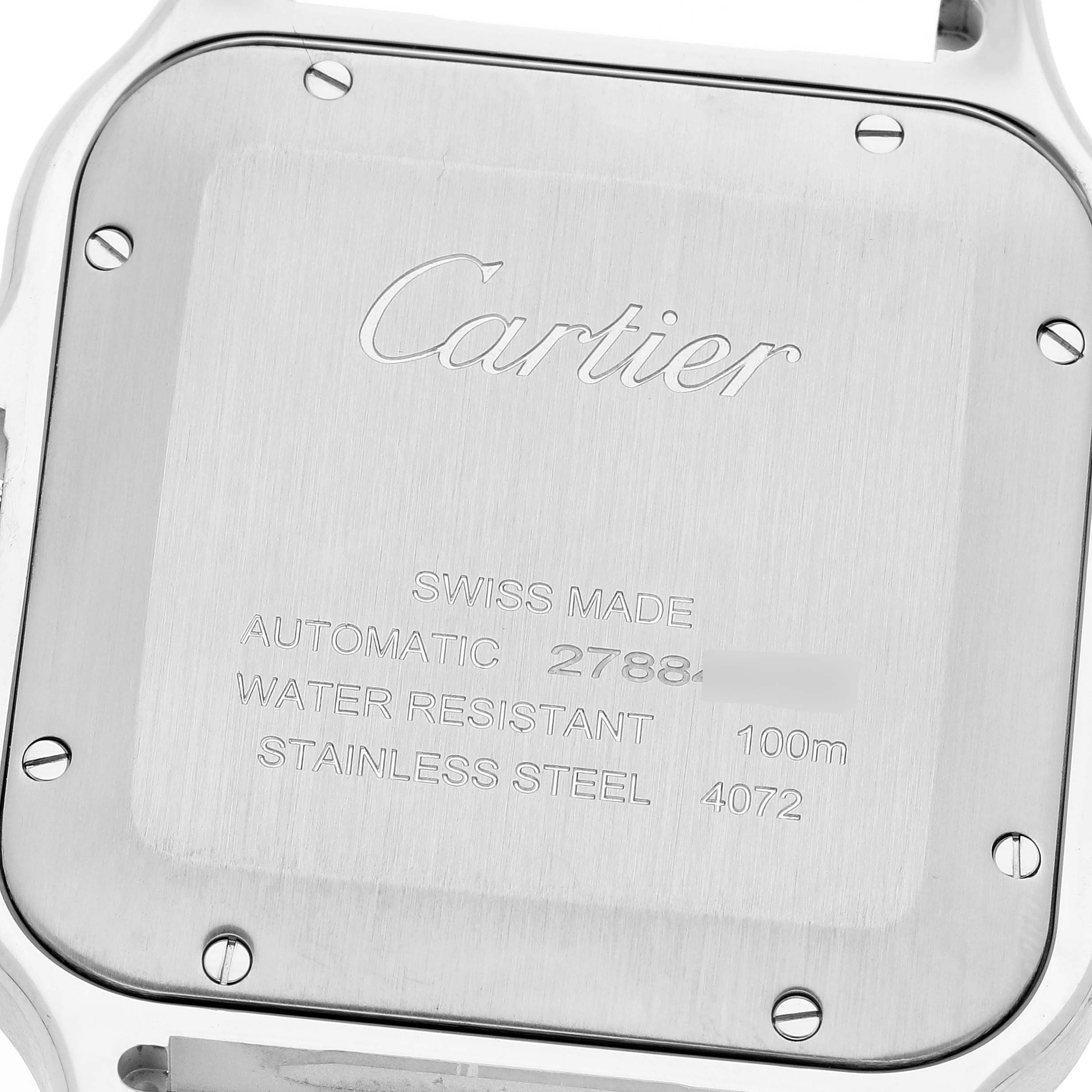 The image shows the back of a Cartier Santos WSSA0030 Men's Stainless Steel Blue Dial WSSA0030 Men's Stainless Steel Blue Dial model watch, displaying details such as "Cartier," "Swiss Made," and technical specifications.