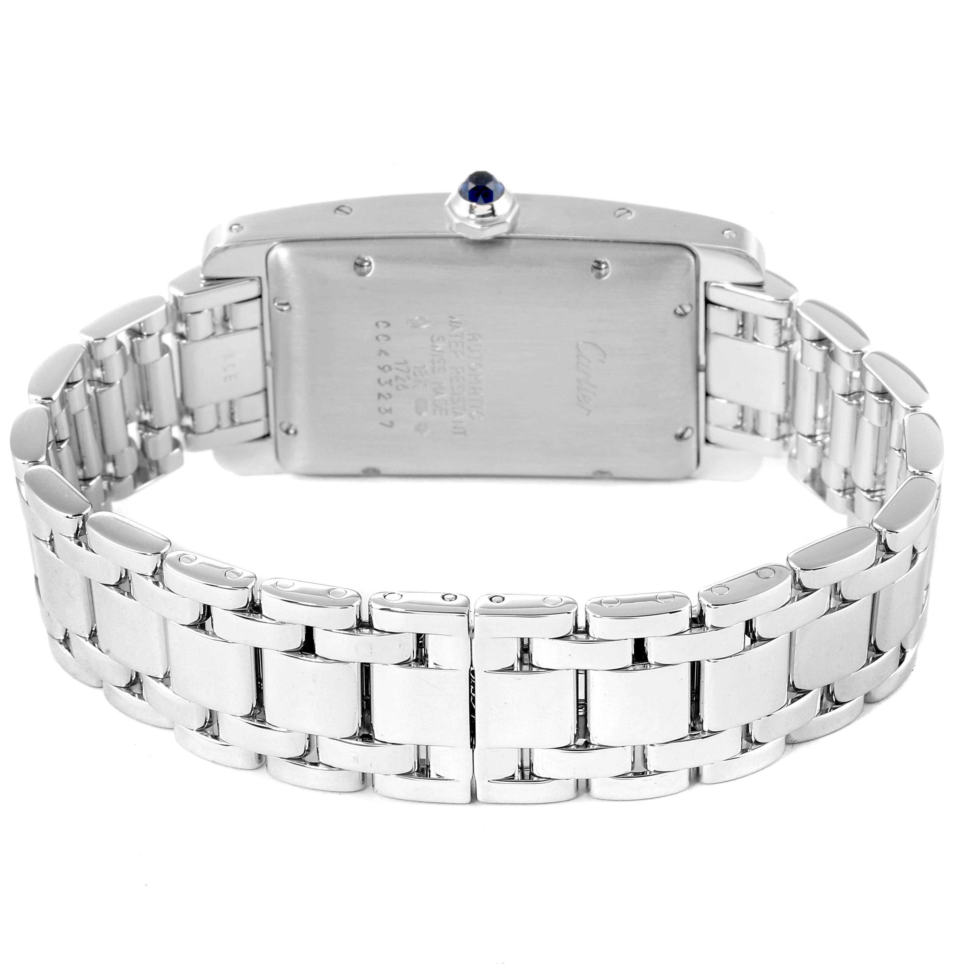 The image shows the back view of the Cartier Tank Americaine W26036L1 Women's White Gold Silver Dial W26036L1 Women's White Gold Silver Dial watch, including its stainless steel case and bracelet.
