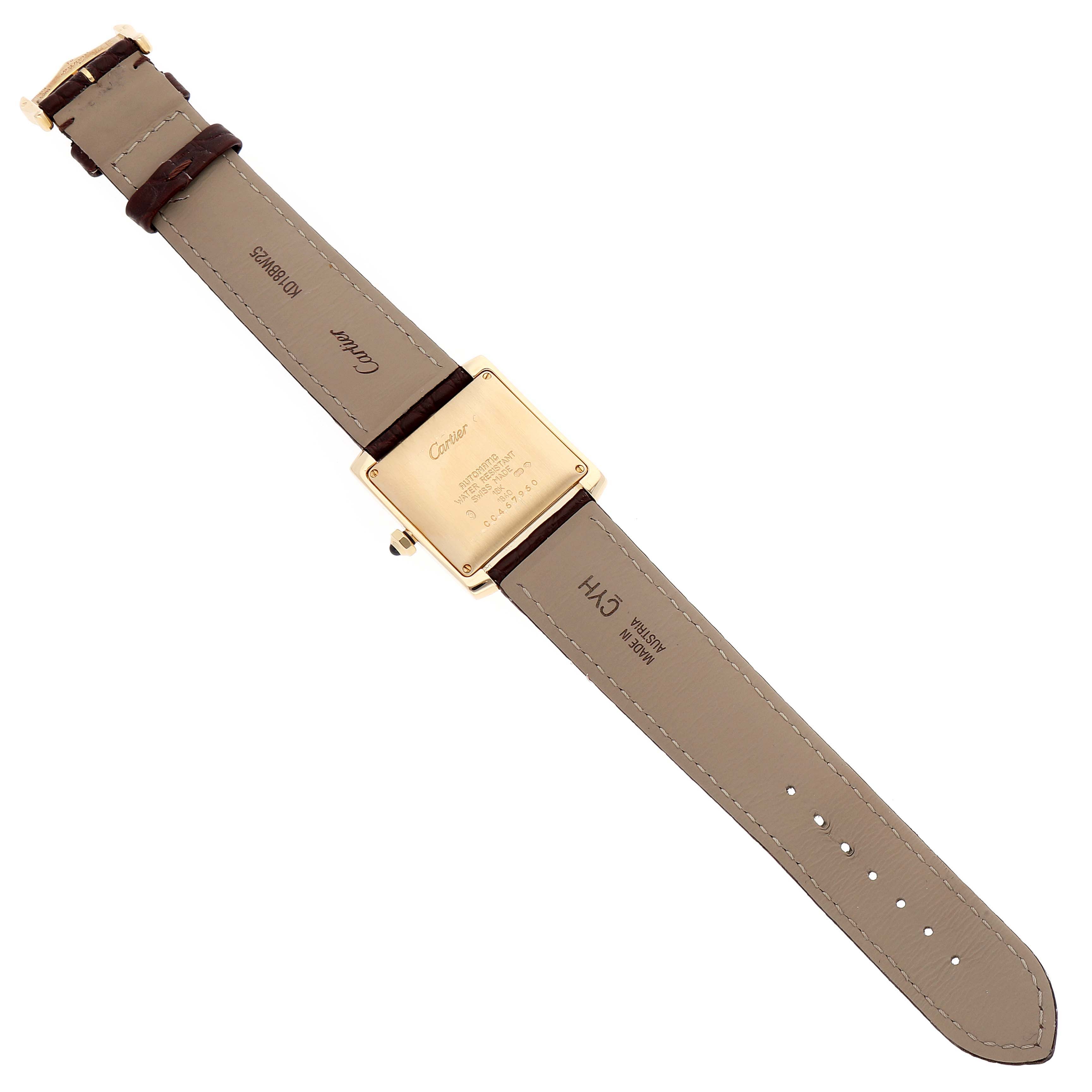 This image shows the back view of a Cartier Tank Francaise W5000156 Men's Yellow Gold Silver Dial W5000156 Men's Yellow Gold Silver Dial watch, including its leather strap and case back.