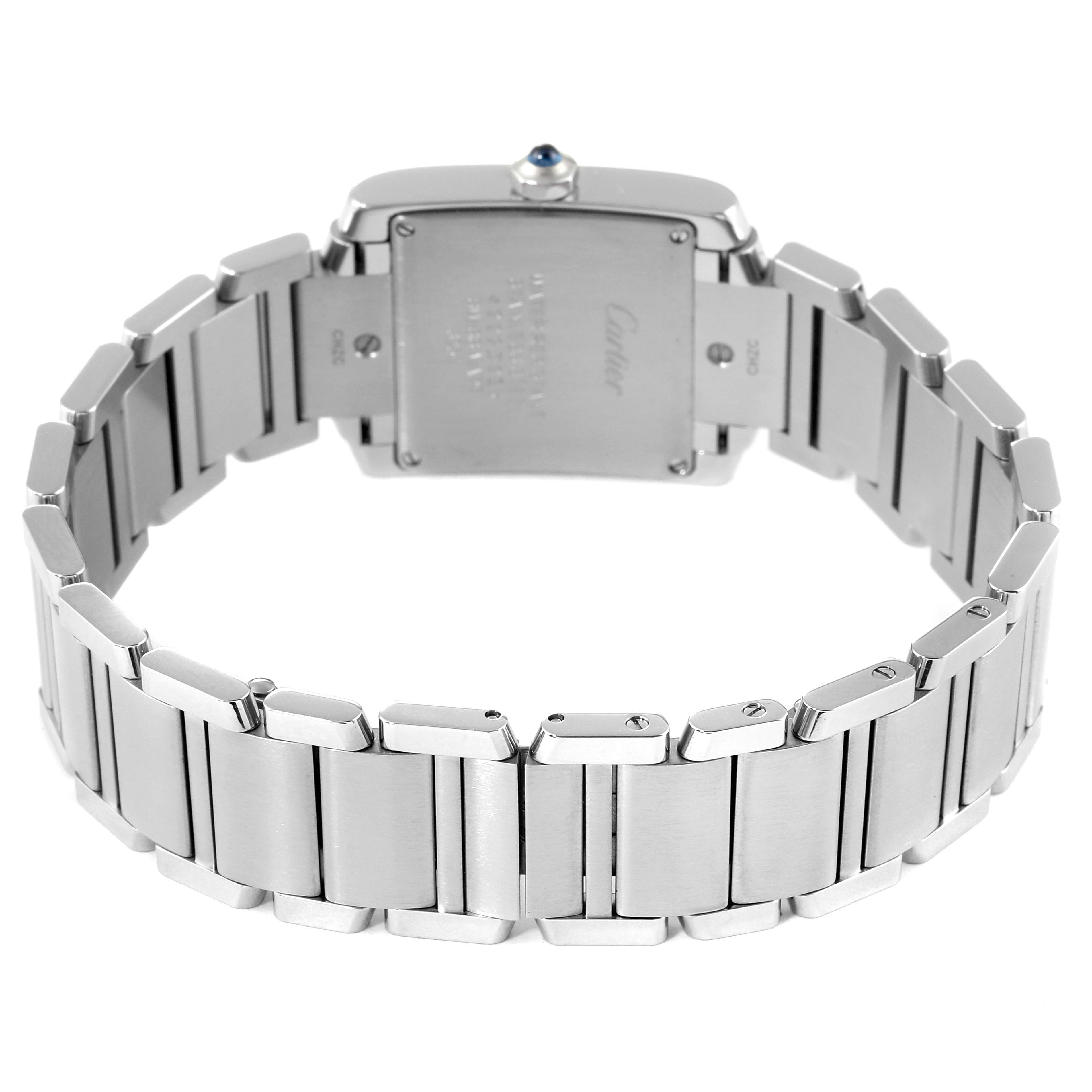 The image shows the back and bracelet of a Cartier Tank Française watch, captured from a rear angle.