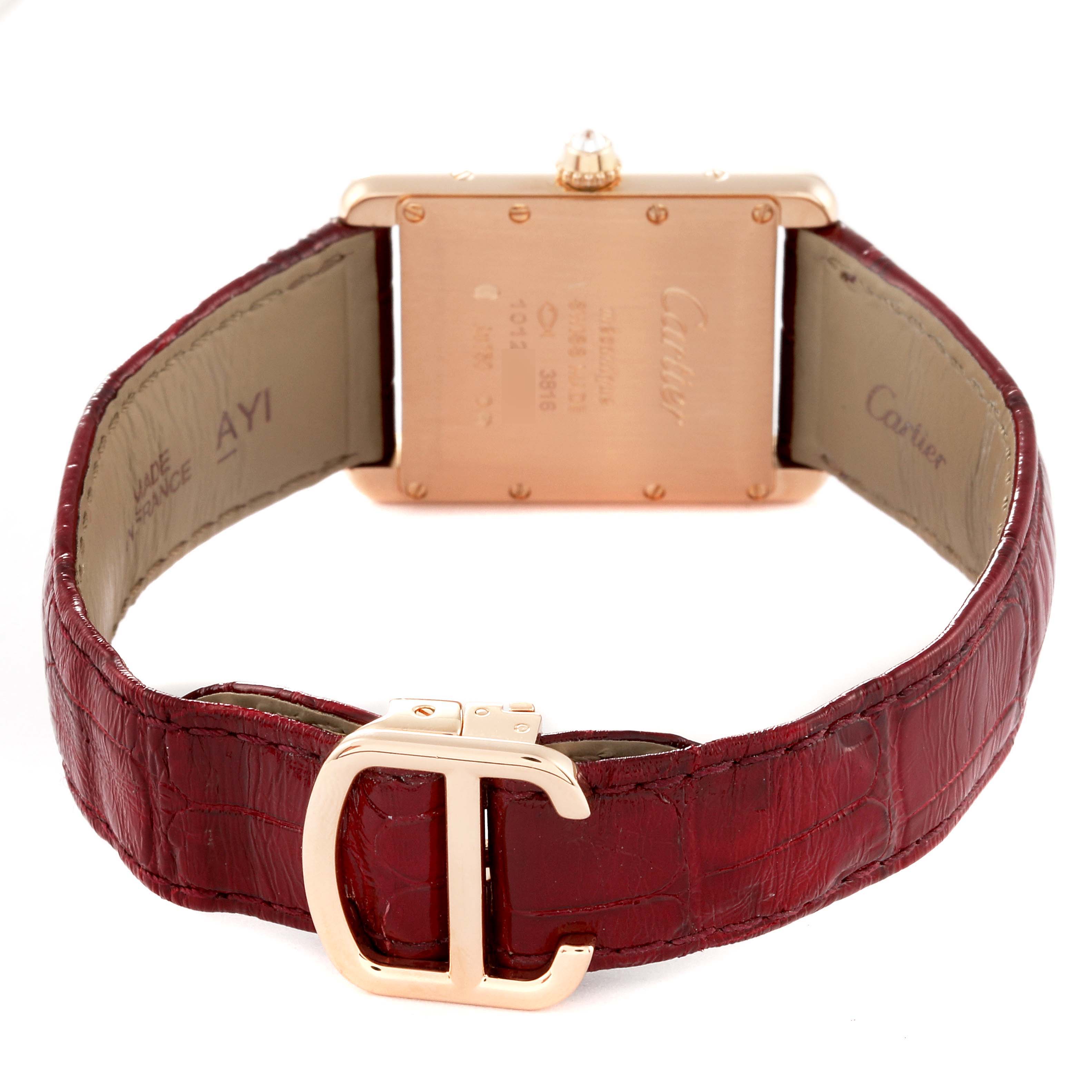 The image shows the back view of a Cartier Tank Louis WJTA0014 Women's Yellow Gold Silver Dial WJTA0014 Women's Yellow Gold Silver Dial watch, featuring the case back and red leather strap with a "C" buckle.