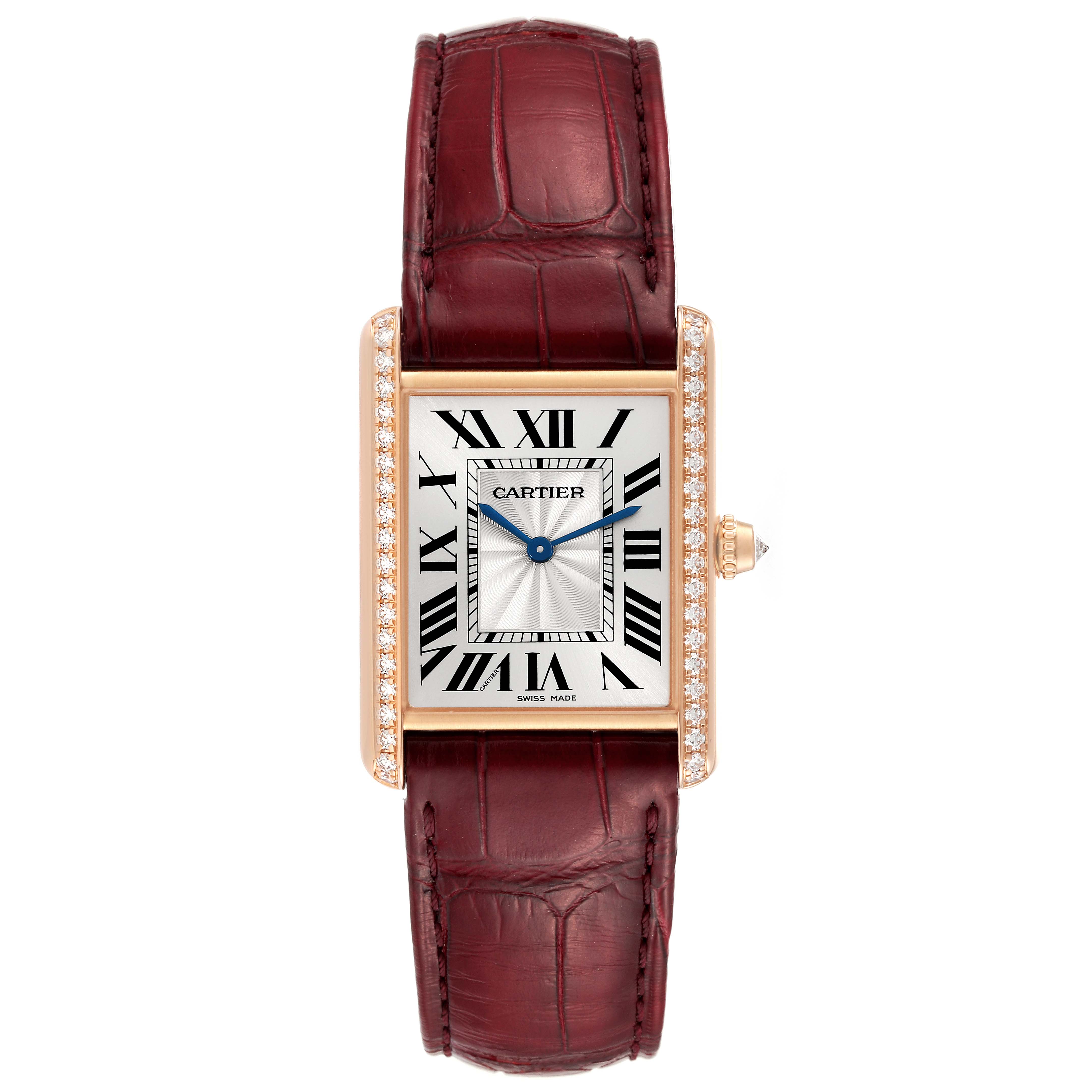 The image shows a frontal view of a Cartier Tank Louis WJTA0014 Women's Yellow Gold Silver Dial WJTA0014 Women's Yellow Gold Silver Dial watch, highlighting its rectangular face, Roman numerals, diamond bezel, and red leather strap.