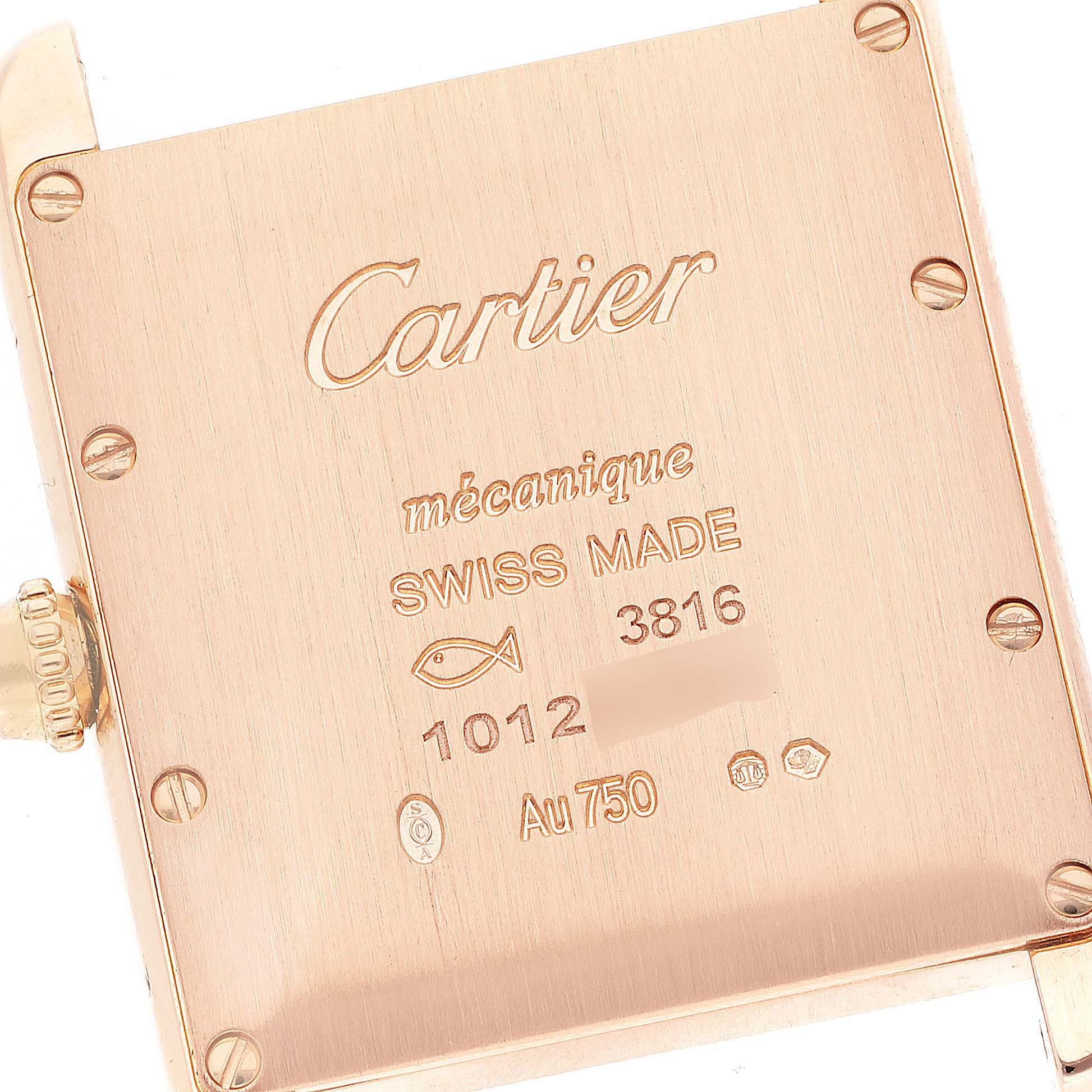 The image shows the back case of a Cartier Tank Louis WJTA0014 Women's Yellow Gold Silver Dial WJTA0014 Women's Yellow Gold Silver Dial watch, featuring engraved details and the crown.