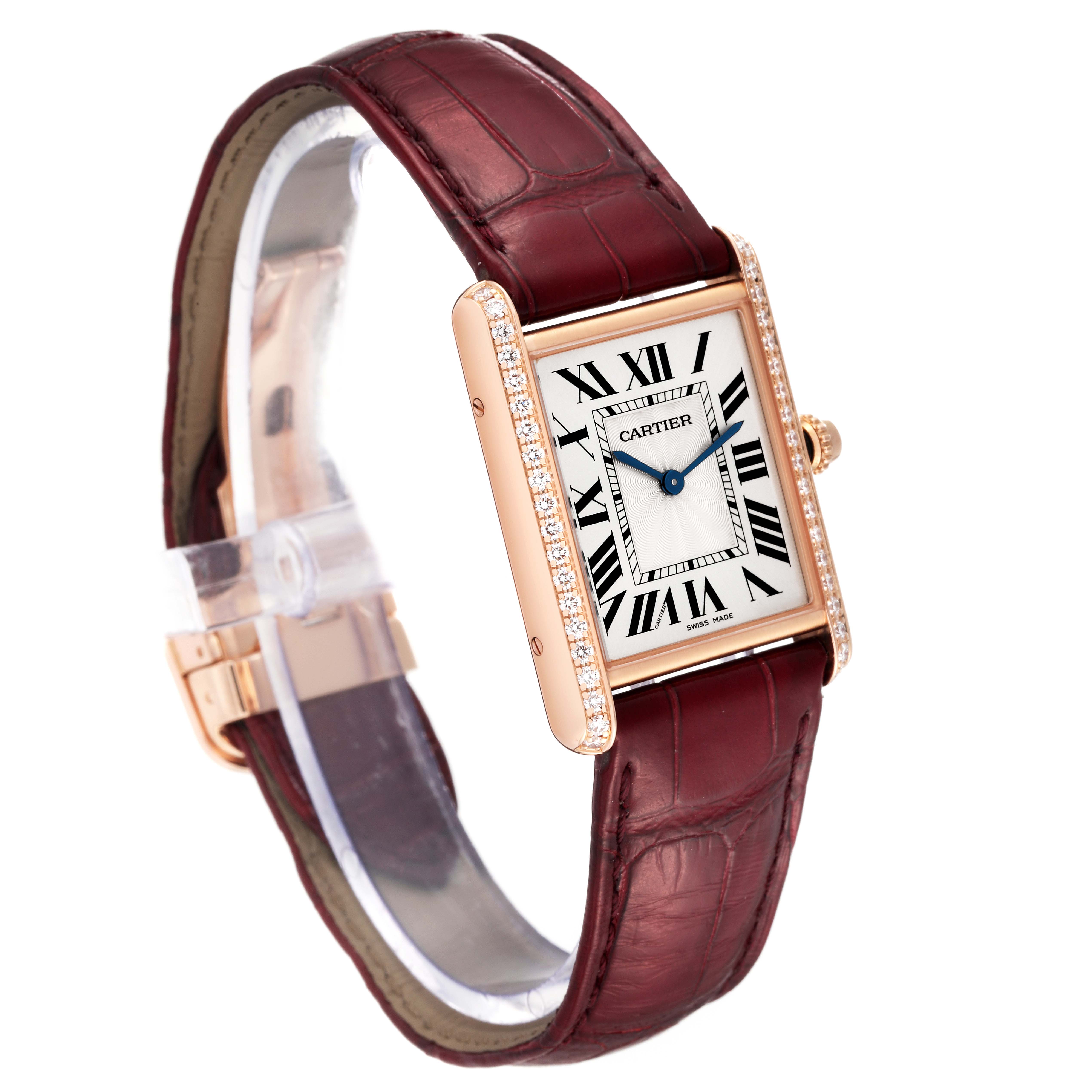 The Cartier Tank Louis WJTA0014 Women's Yellow Gold Silver Dial WJTA0014 Women's Yellow Gold Silver Dial watch is shown from a three-quarter angle, highlighting its face, strap, and bejeweled case.