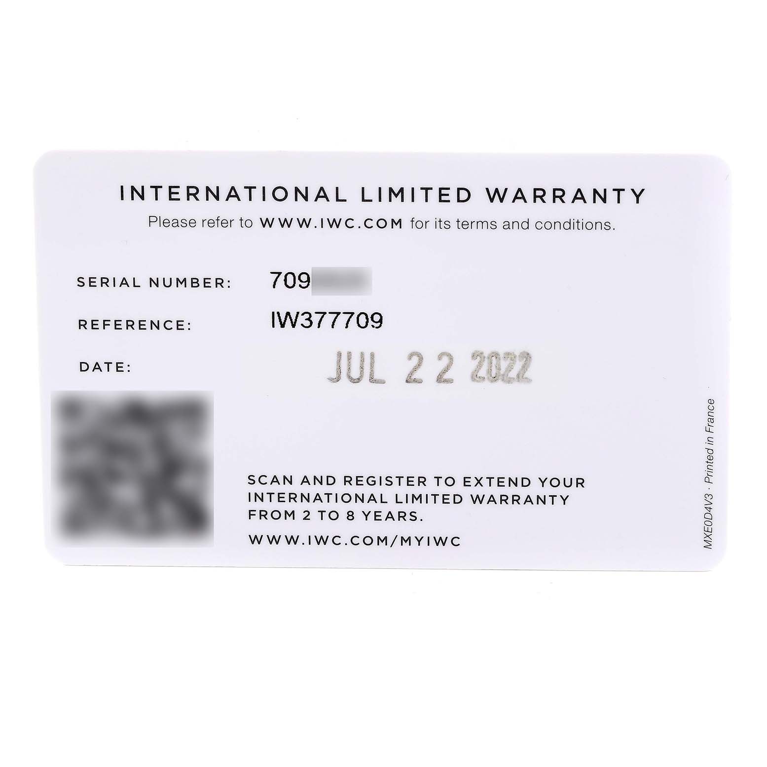 The image shows an IWC International Limited Warranty card for a Pilot model watch, displaying the serial number, reference number, and date.