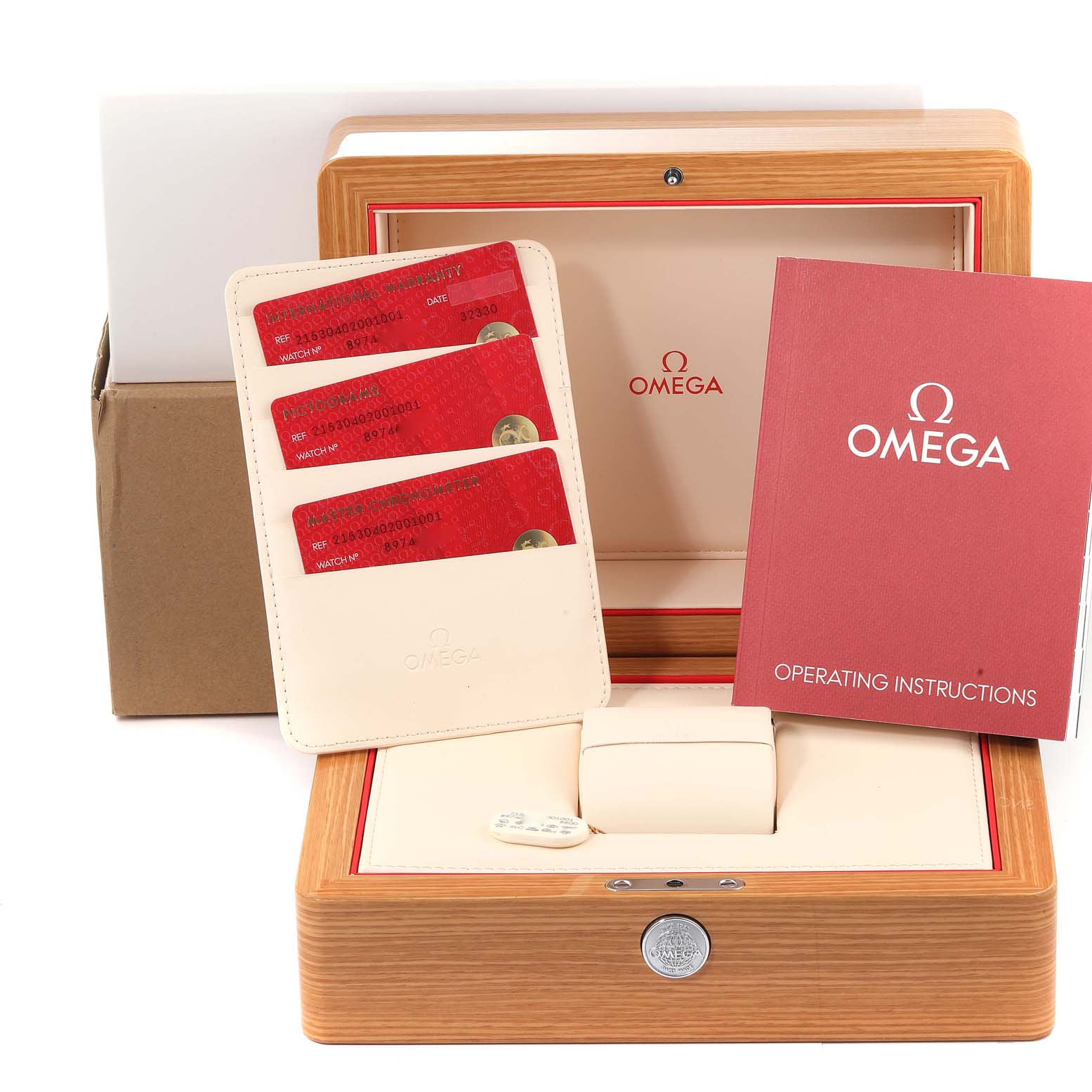 The image shows an Omega Planet Ocean 215.30.40.20.01.001 Men
s Stainless Steel Black Dial 215.30.40.20.01.001 Men
s Stainless Steel Black Dial watch box with operating instructions and warranty cards.