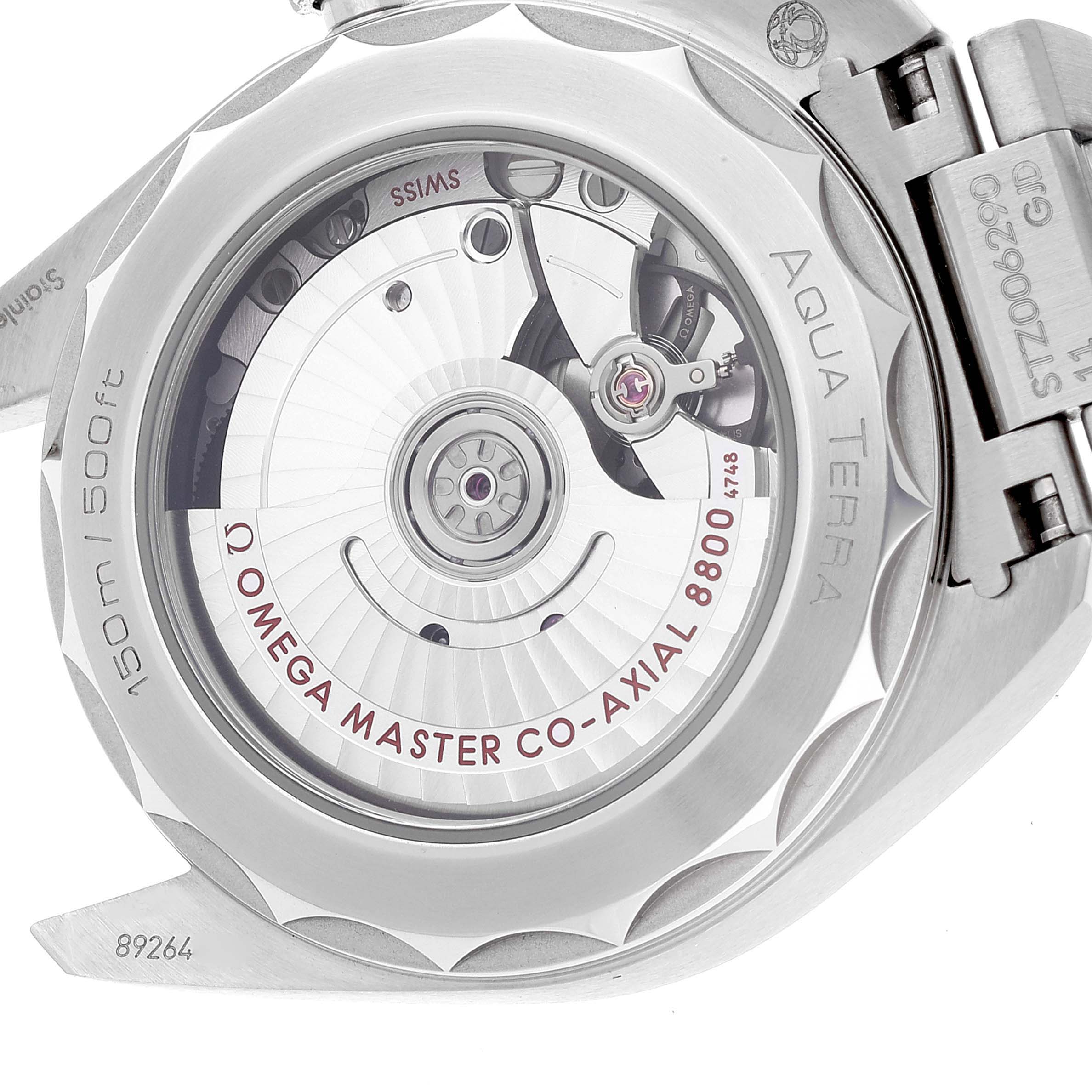 This image shows the back of the Omega Aqua Terra 220.10.38.20.01.001 Men's Stainless Steel Black Dial 220.10.38.20.01.001 Men's Stainless Steel Black Dial watch, displaying its mechanical movement and rotor.